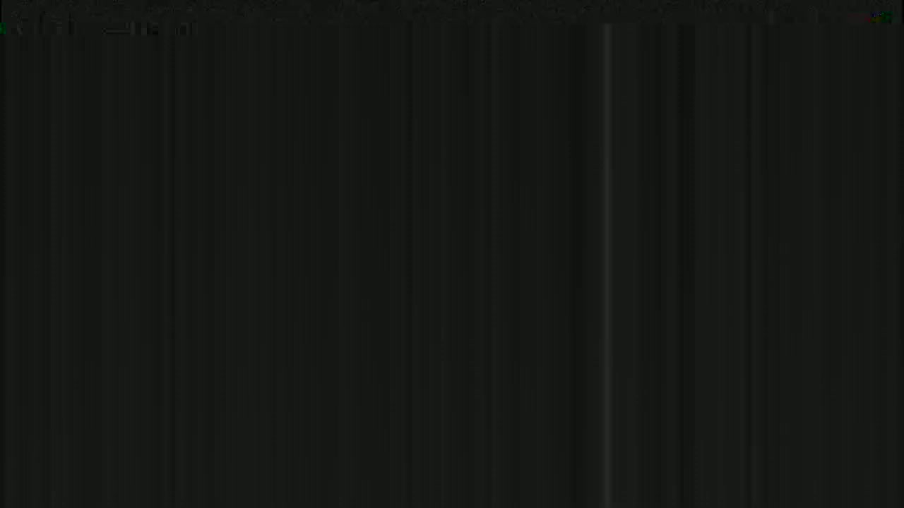 The image shows a dark, vertically-striped pattern.