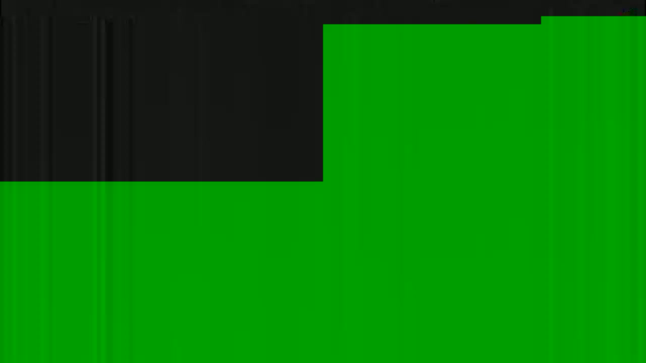 The image shows a mostly green screen with a smaller black section at the top left.