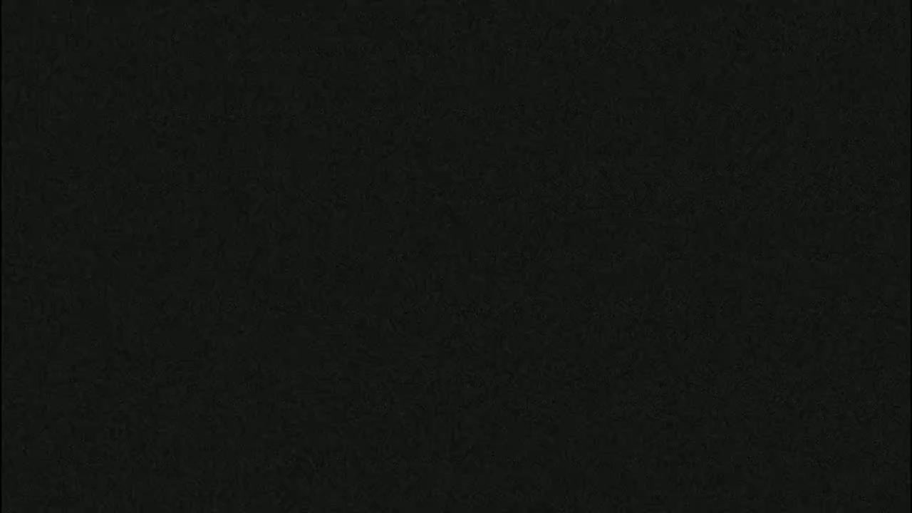 The image is a solid, dark-grey textured background.