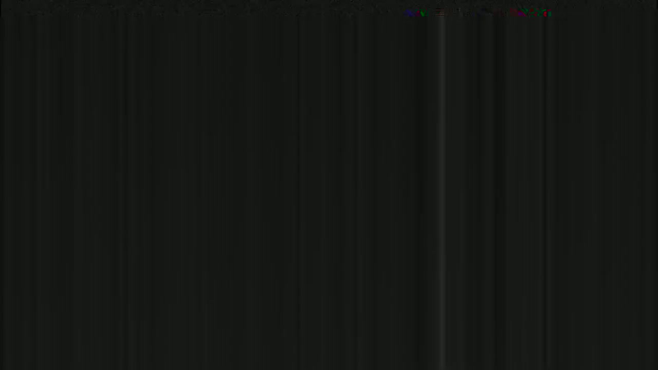 The image shows a dark, vertically-striped pattern.