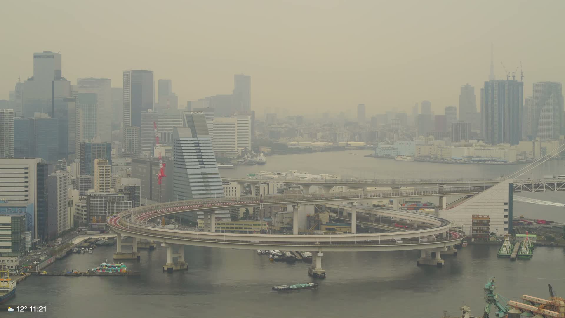 Tokyo City Center Skyline, Tokyo Bay & Rainbow Bridge Kaigan Entrance (東京の街並み、東京湾、レインボーブリッジ)  Live Cam - 5 Chome, Konan, Minato-ku, Tokyo, Kantō, Honshu, Japan