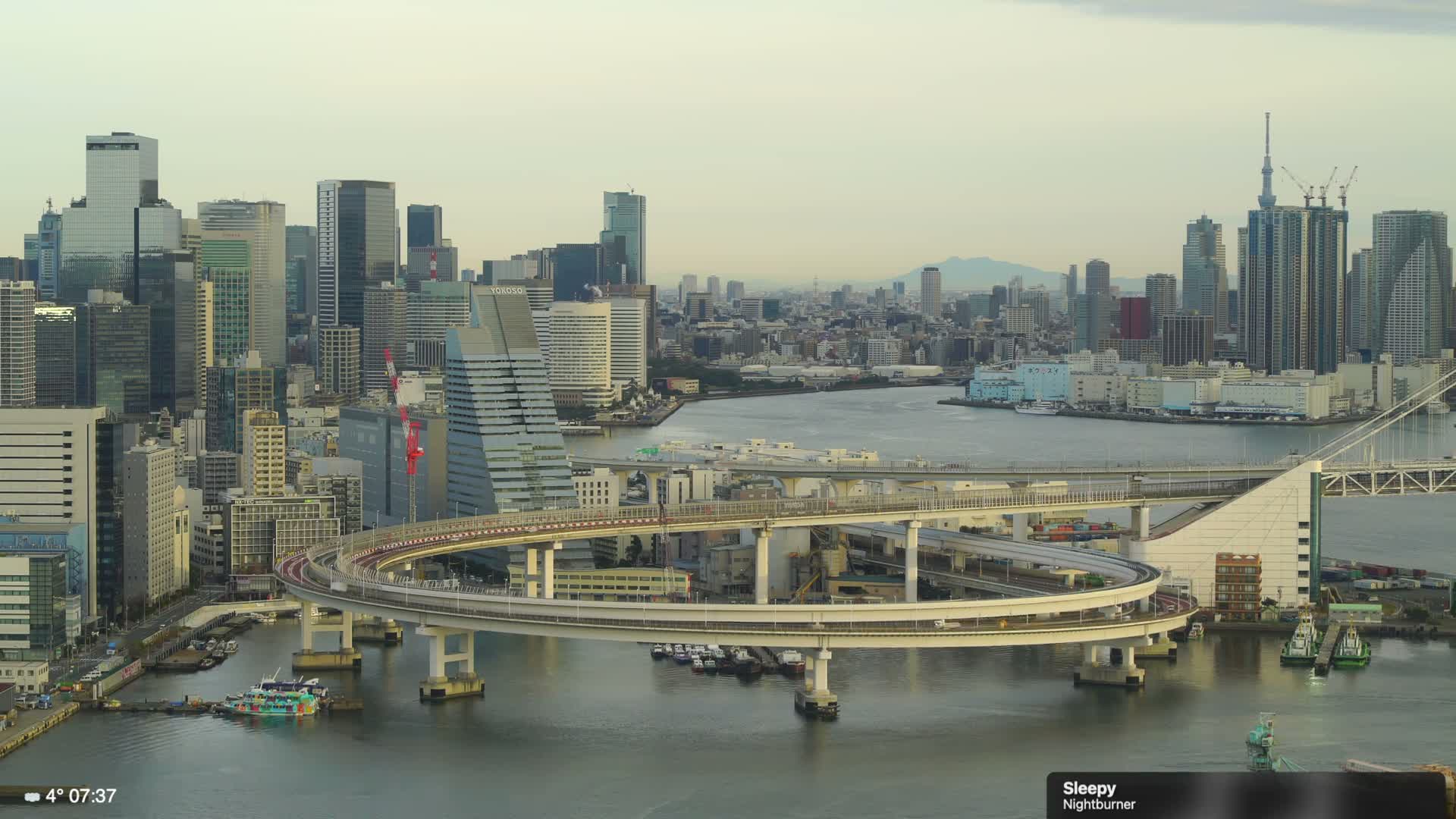 Tokyo City Center Skyline, Tokyo Bay & Rainbow Bridge Kaigan Entrance (東京の街並み、東京湾、レインボーブリッジ)  Live Cam - 5 Chome, Konan, Minato-ku, Tokyo, Kantō, Honshu, Japan