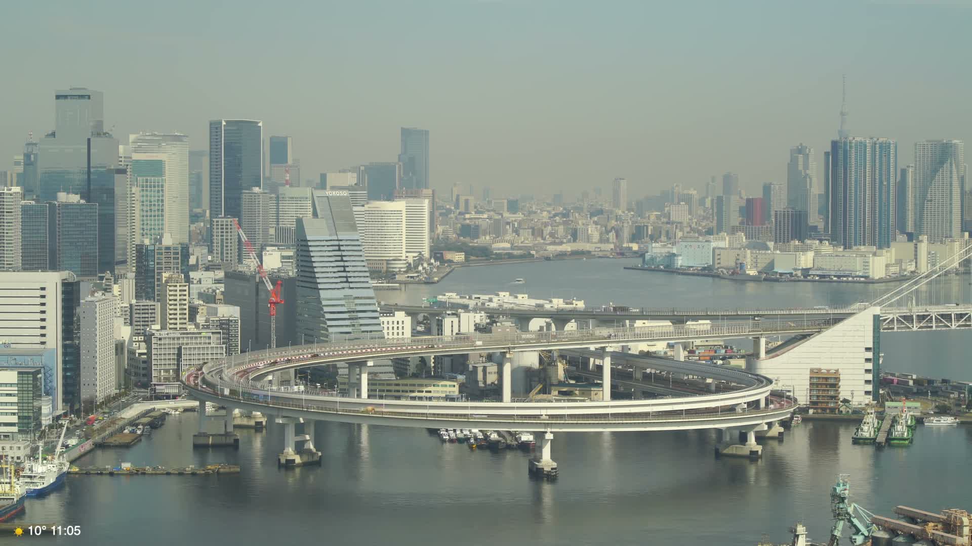 Tokyo City Center Skyline, Tokyo Bay & Rainbow Bridge Kaigan Entrance (東京の街並み、東京湾、レインボーブリッジ)  Live Cam - 5 Chome, Konan, Minato-ku, Tokyo, Kantō, Honshu, Japan