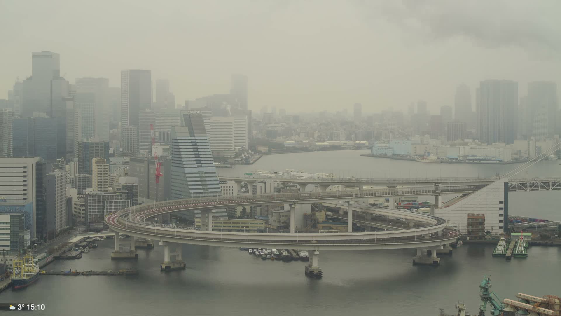 Tokyo City Center Skyline, Tokyo Bay & Rainbow Bridge Kaigan Entrance (東京の街並み、東京湾、レインボーブリッジ)  Live Cam - 5 Chome, Konan, Minato-ku, Tokyo, Kantō, Honshu, Japan