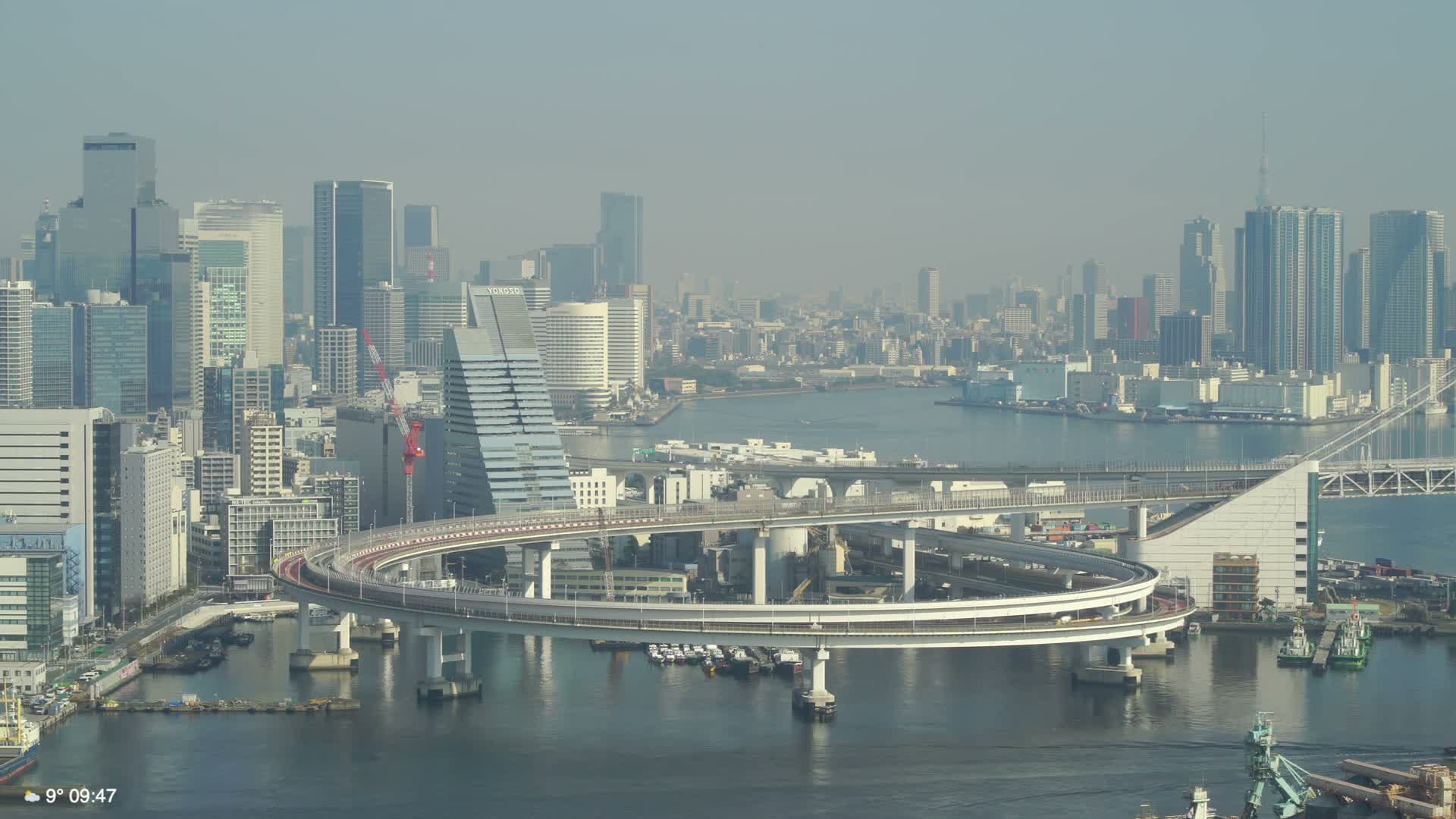 Tokyo City Center Skyline, Tokyo Bay & Rainbow Bridge Kaigan Entrance (東京の街並み、東京湾、レインボーブリッジ)  Live Cam - 5 Chome, Konan, Minato-ku, Tokyo, Kantō, Honshu, Japan