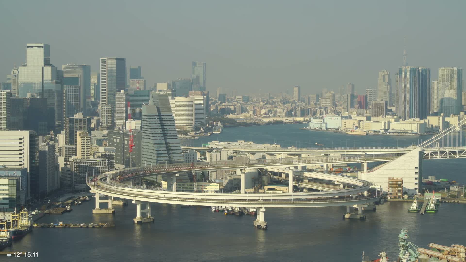 Tokyo City Center Skyline, Tokyo Bay & Rainbow Bridge Kaigan Entrance (東京の街並み、東京湾、レインボーブリッジ)  Live Cam - 5 Chome, Konan, Minato-ku, Tokyo, Kantō, Honshu, Japan