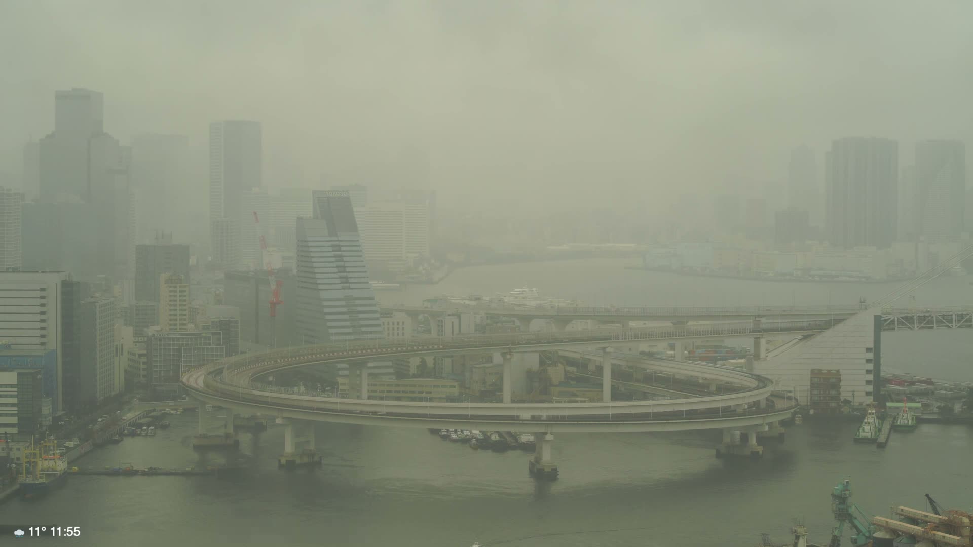 Tokyo City Center Skyline, Tokyo Bay & Rainbow Bridge Kaigan Entrance (東京の街並み、東京湾、レインボーブリッジ)  Live Cam - 5 Chome, Konan, Minato-ku, Tokyo, Kantō, Honshu, Japan