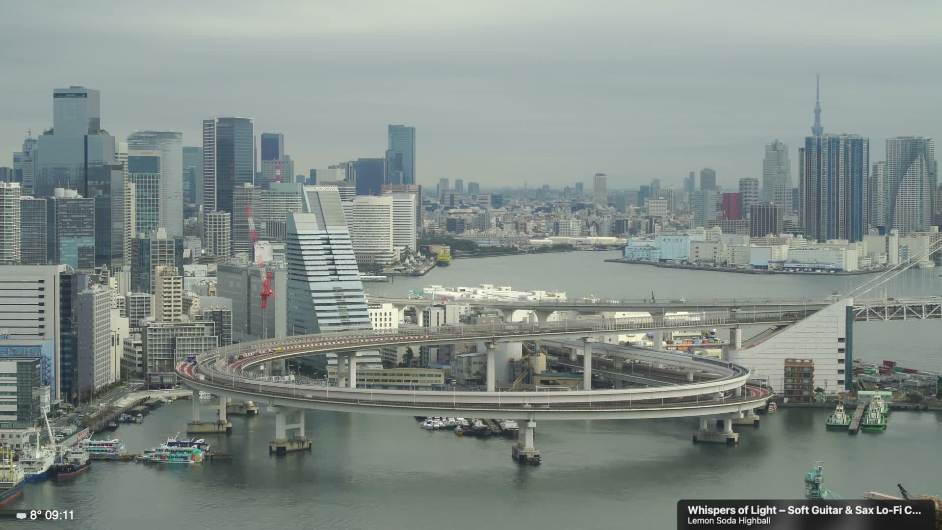 Tokyo City Center Skyline, Tokyo Bay & Rainbow Bridge Kaigan Entrance (東京の街並み、東京湾、レインボーブリッジ)  Live Cam - 5 Chome, Konan, Minato-ku, Tokyo, Kantō, Honshu, Japan
