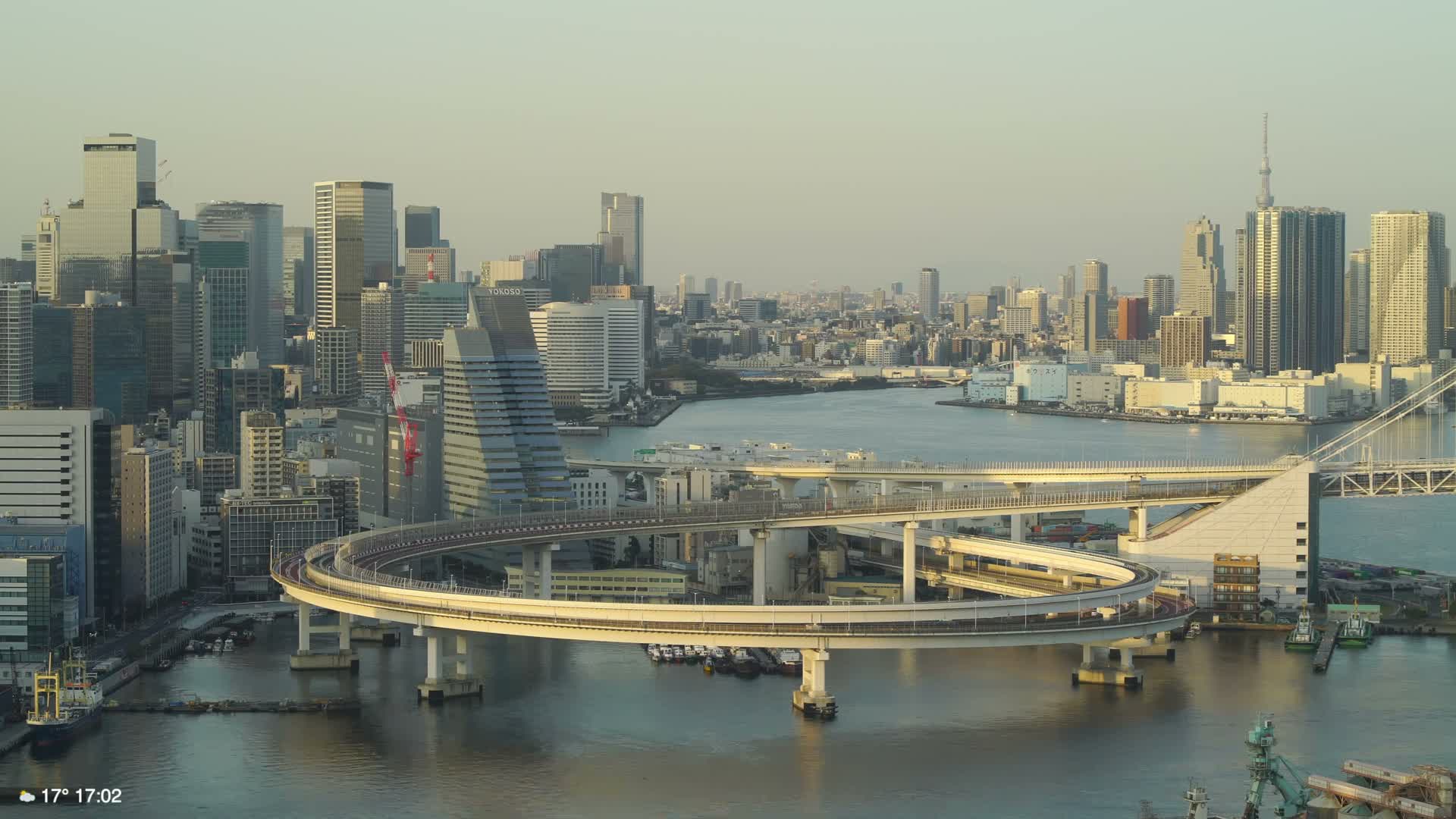 Tokyo City Center Skyline, Tokyo Bay & Rainbow Bridge Kaigan Entrance (東京の街並み、東京湾、レインボーブリッジ)  Live Cam - 5 Chome, Konan, Minato-ku, Tokyo, Kantō, Honshu, Japan