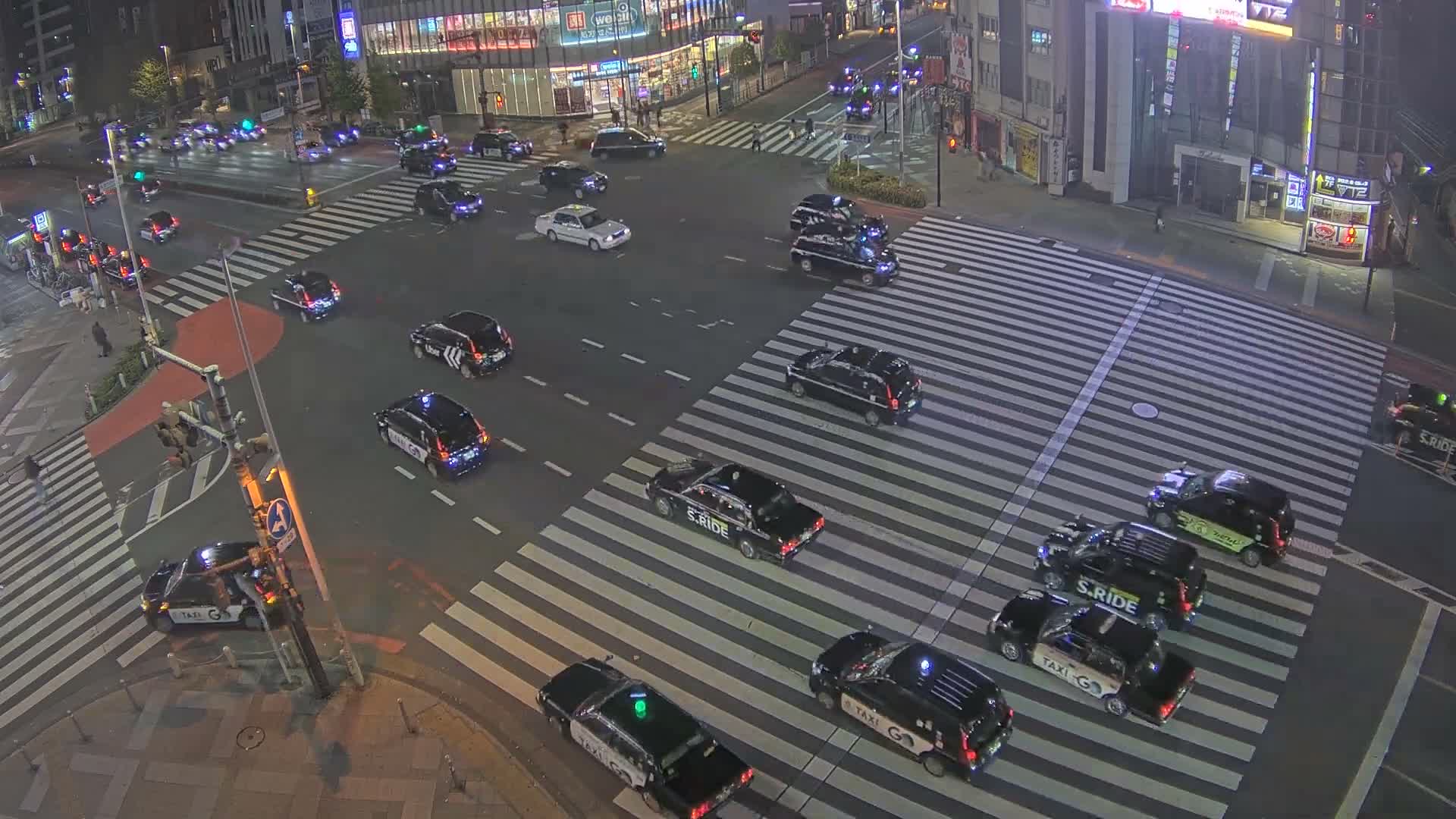 Tokyo, Shinjuku, Ome-kaido Avenue & Otakibashi-dori O Guard Intersection Scramble Crossing ( 東京 新宿青梅街道・小滝橋通り大ガード交差点スクランブル交差点) Live Cam  - Nishishinjuku, Shinjuku-ku, Tokyo, Kantō, Honshu, Japan