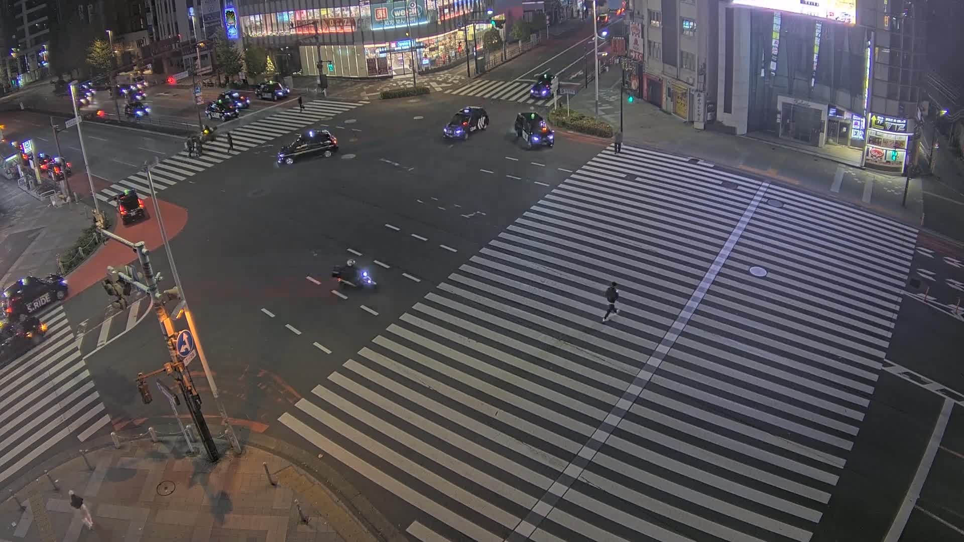 Tokyo, Shinjuku, Ome-kaido Avenue & Otakibashi-dori O Guard Intersection Scramble Crossing ( 東京 新宿青梅街道・小滝橋通り大ガード交差点スクランブル交差点) Live Cam  - Nishishinjuku, Shinjuku-ku, Tokyo, Kantō, Honshu, Japan