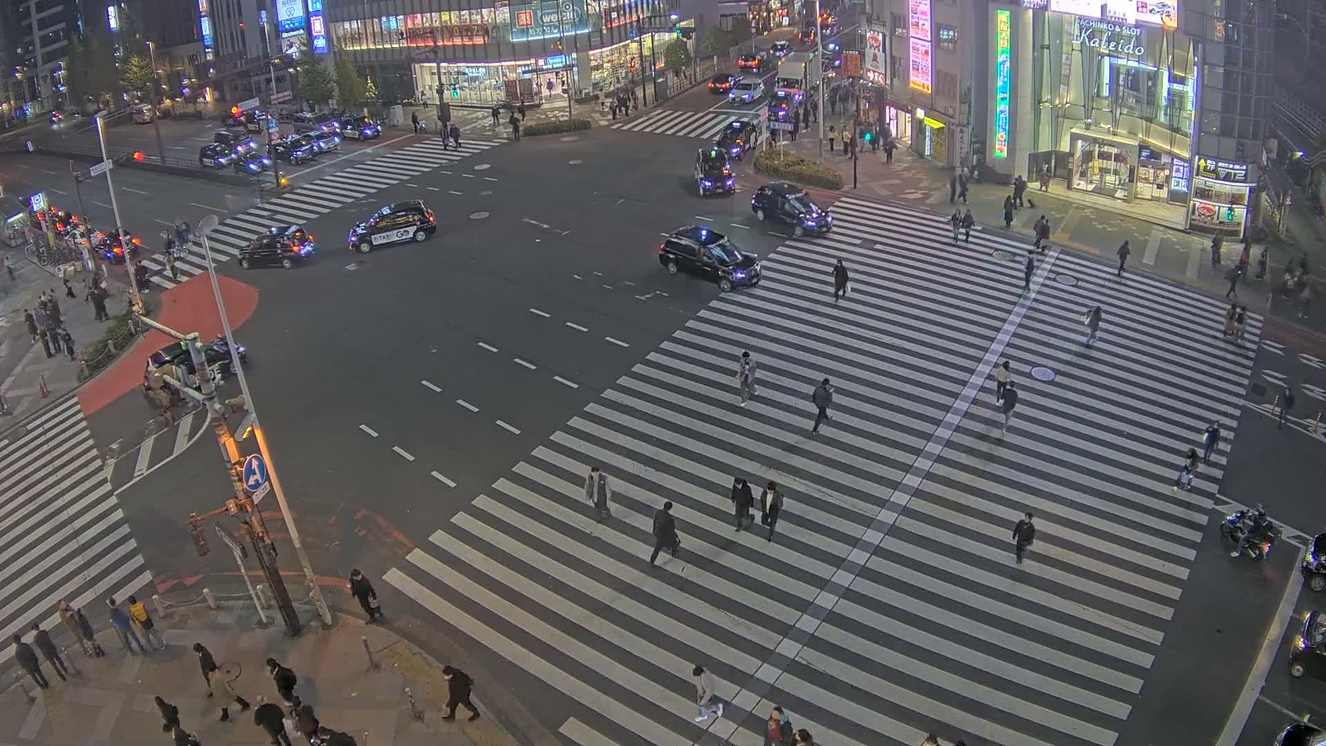 Tokyo, Shinjuku, Ome-kaido Avenue & Otakibashi-dori O Guard Intersection Scramble Crossing ( 東京 新宿青梅街道・小滝橋通り大ガード交差点スクランブル交差点) Live Cam  - Nishishinjuku, Shinjuku-ku, Tokyo, Kantō, Honshu, Japan