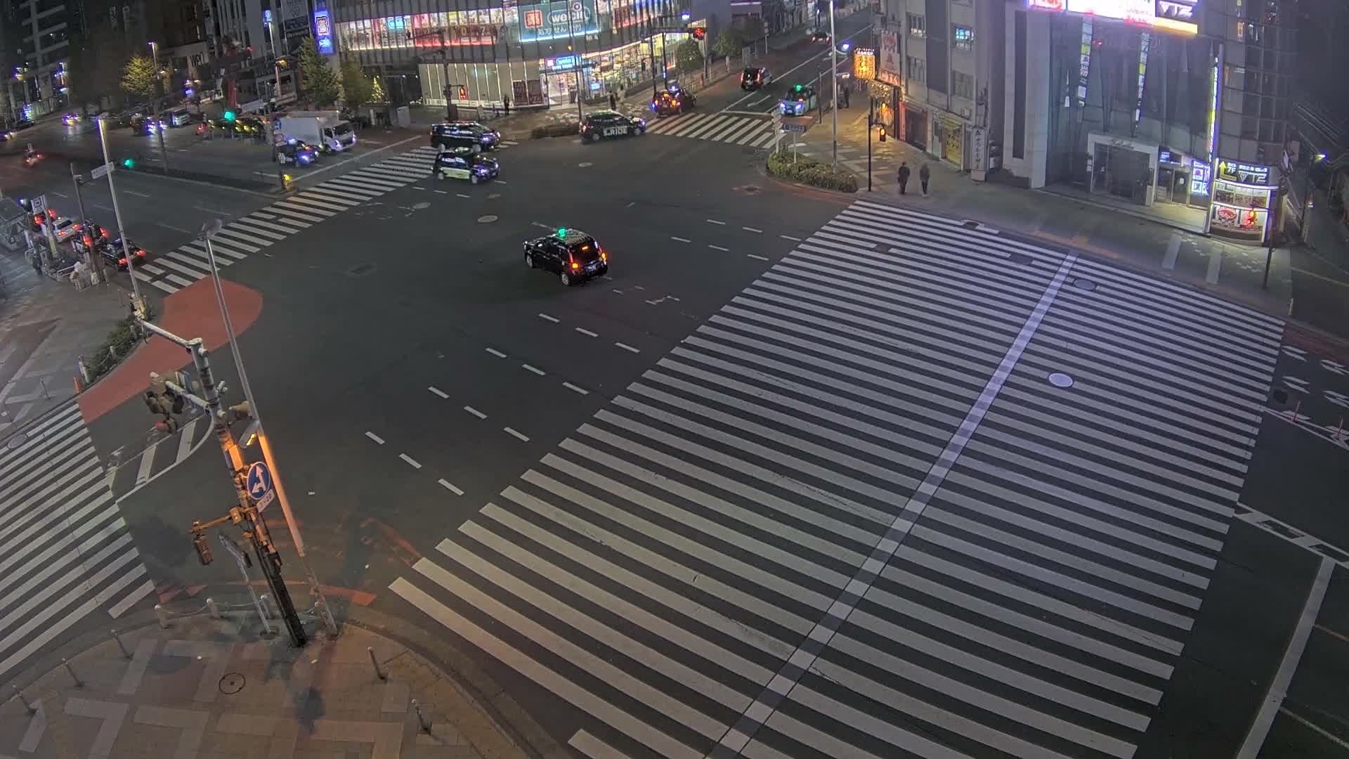 Tokyo, Shinjuku, Ome-kaido Avenue & Otakibashi-dori O Guard Intersection Scramble Crossing ( 東京 新宿青梅街道・小滝橋通り大ガード交差点スクランブル交差点) Live Cam  - Nishishinjuku, Shinjuku-ku, Tokyo, Kantō, Honshu, Japan