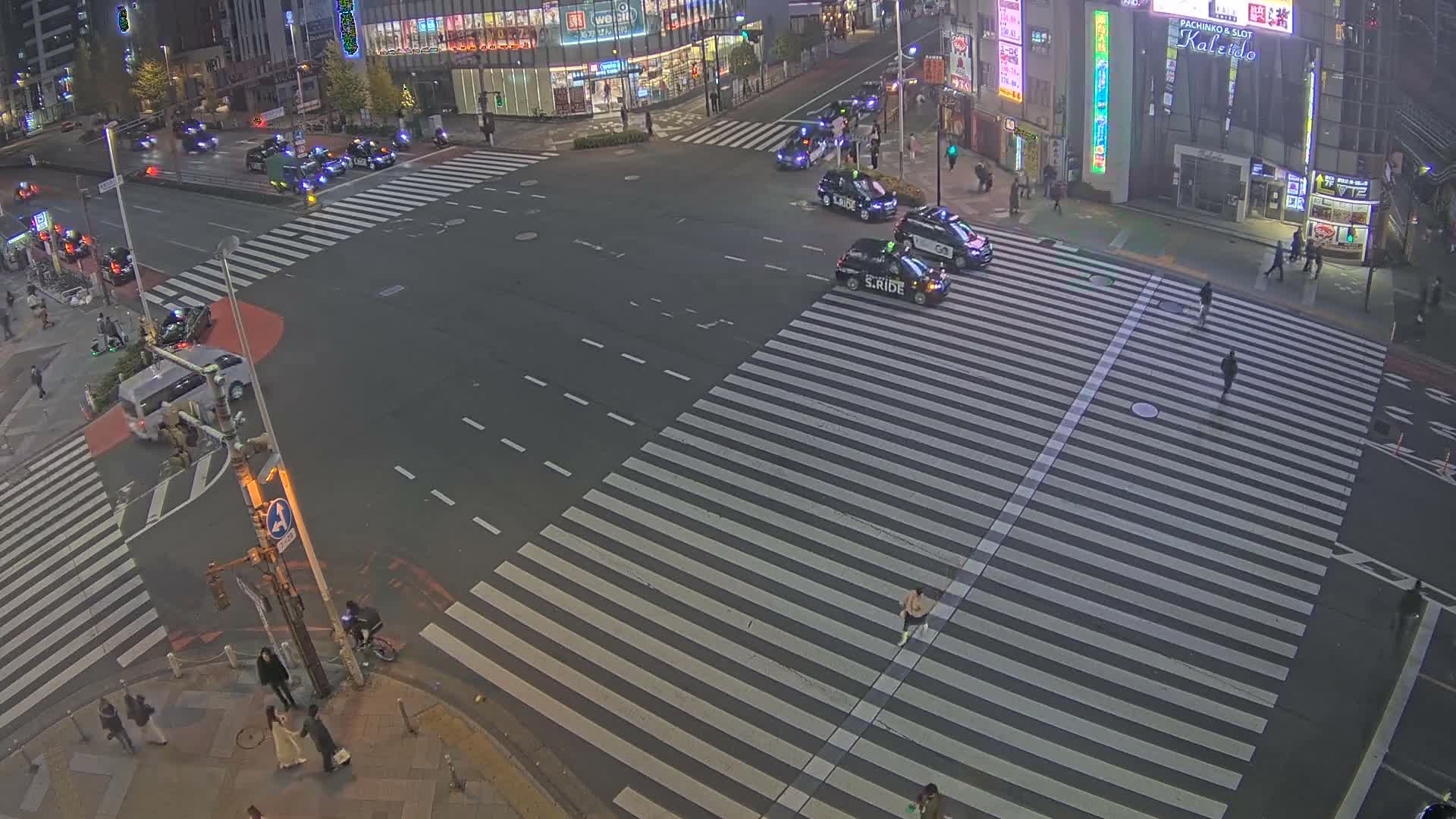 Tokyo, Shinjuku, Ome-kaido Avenue & Otakibashi-dori O Guard Intersection Scramble Crossing ( 東京 新宿青梅街道・小滝橋通り大ガード交差点スクランブル交差点) Live Cam  - Nishishinjuku, Shinjuku-ku, Tokyo, Kantō, Honshu, Japan
