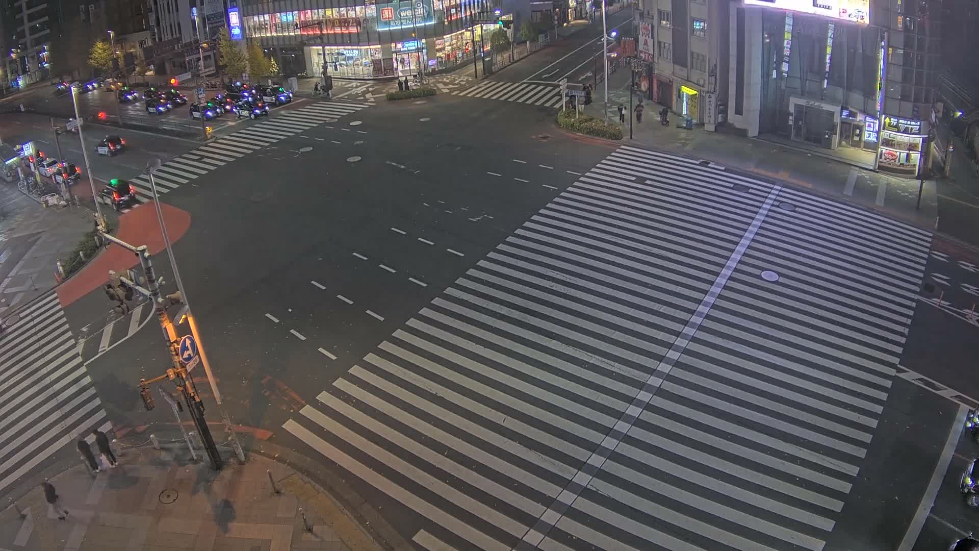 Tokyo, Shinjuku, Ome-kaido Avenue & Otakibashi-dori O Guard Intersection Scramble Crossing ( 東京 新宿青梅街道・小滝橋通り大ガード交差点スクランブル交差点) Live Cam  - Nishishinjuku, Shinjuku-ku, Tokyo, Kantō, Honshu, Japan