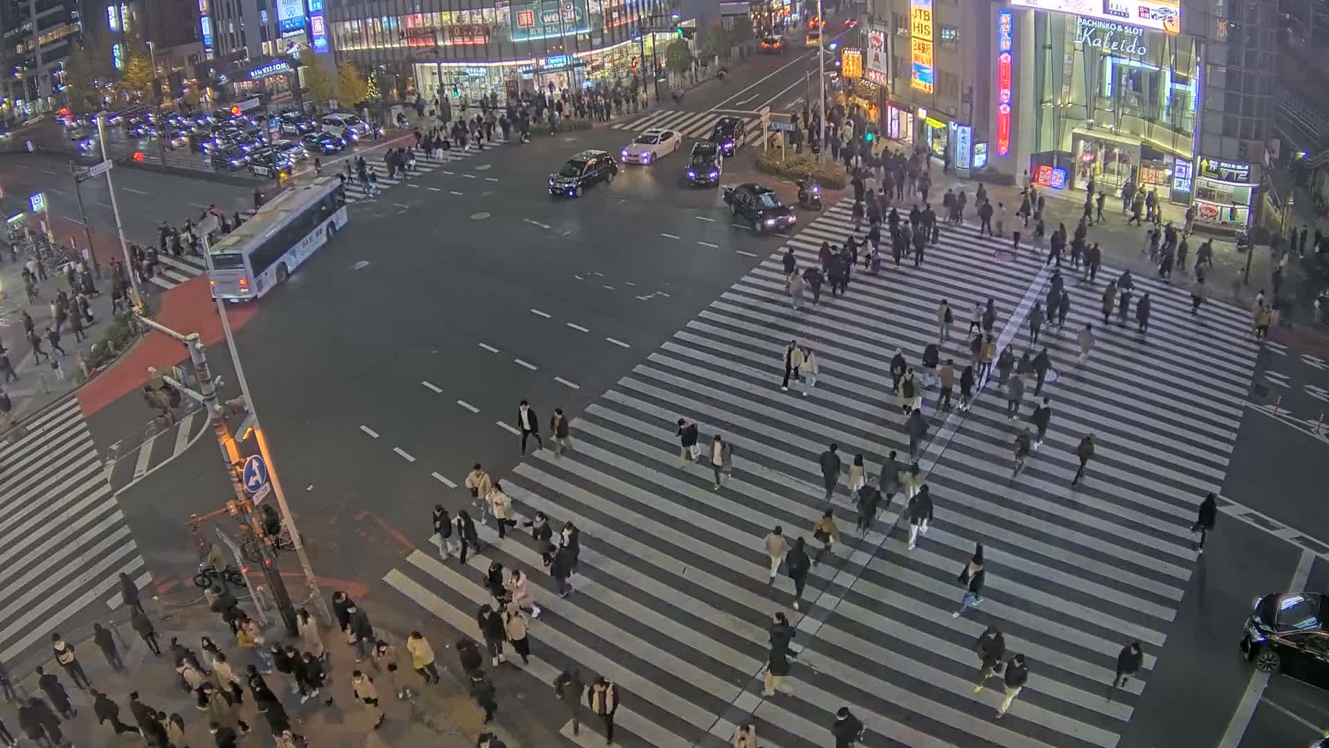 Tokyo, Shinjuku, Ome-kaido Avenue & Otakibashi-dori O Guard Intersection Scramble Crossing ( 東京 新宿青梅街道・小滝橋通り大ガード交差点スクランブル交差点) Live Cam  - Nishishinjuku, Shinjuku-ku, Tokyo, Kantō, Honshu, Japan
