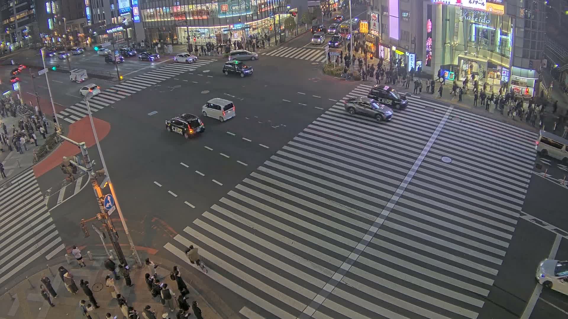 Tokyo, Shinjuku, Ome-kaido Avenue & Otakibashi-dori O Guard Intersection Scramble Crossing ( 東京 新宿青梅街道・小滝橋通り大ガード交差点スクランブル交差点) Live Cam  - Nishishinjuku, Shinjuku-ku, Tokyo, Kantō, Honshu, Japan