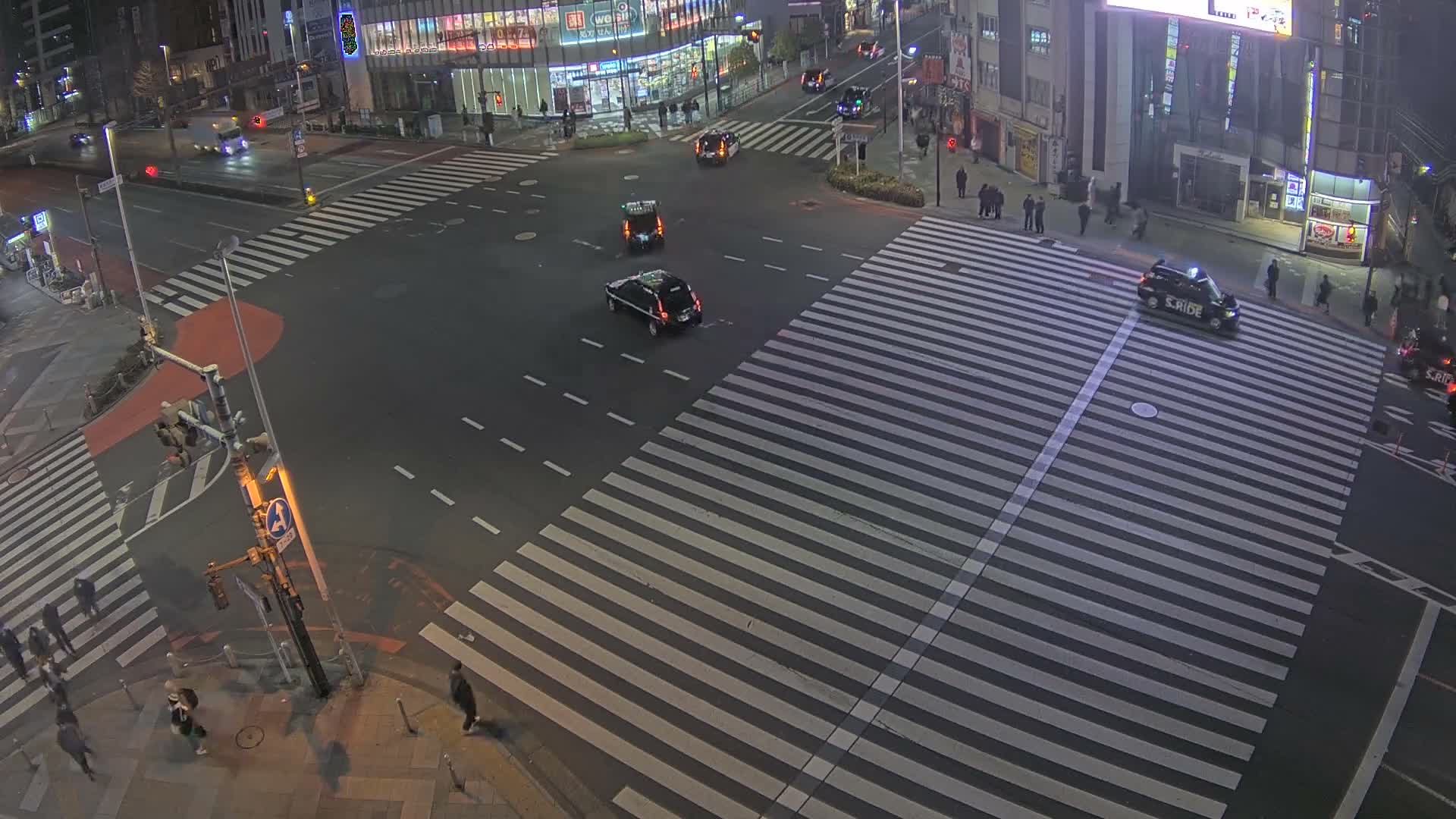 Tokyo, Shinjuku, Ome-kaido Avenue & Otakibashi-dori O Guard Intersection Scramble Crossing ( 東京 新宿青梅街道・小滝橋通り大ガード交差点スクランブル交差点) Live Cam  - Nishishinjuku, Shinjuku-ku, Tokyo, Kantō, Honshu, Japan