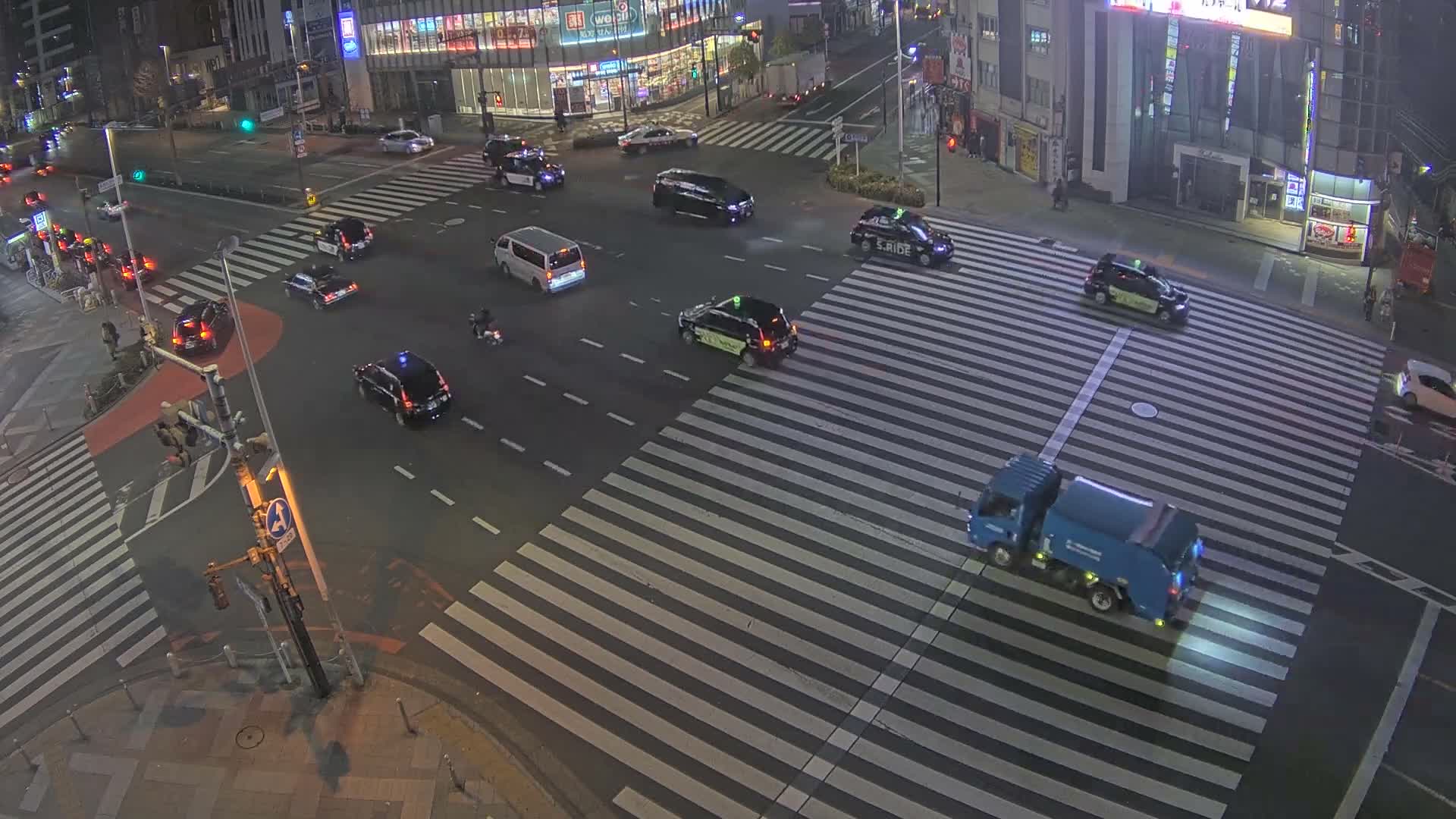 Tokyo, Shinjuku, Ome-kaido Avenue & Otakibashi-dori O Guard Intersection Scramble Crossing ( 東京 新宿青梅街道・小滝橋通り大ガード交差点スクランブル交差点) Live Cam  - Nishishinjuku, Shinjuku-ku, Tokyo, Kantō, Honshu, Japan