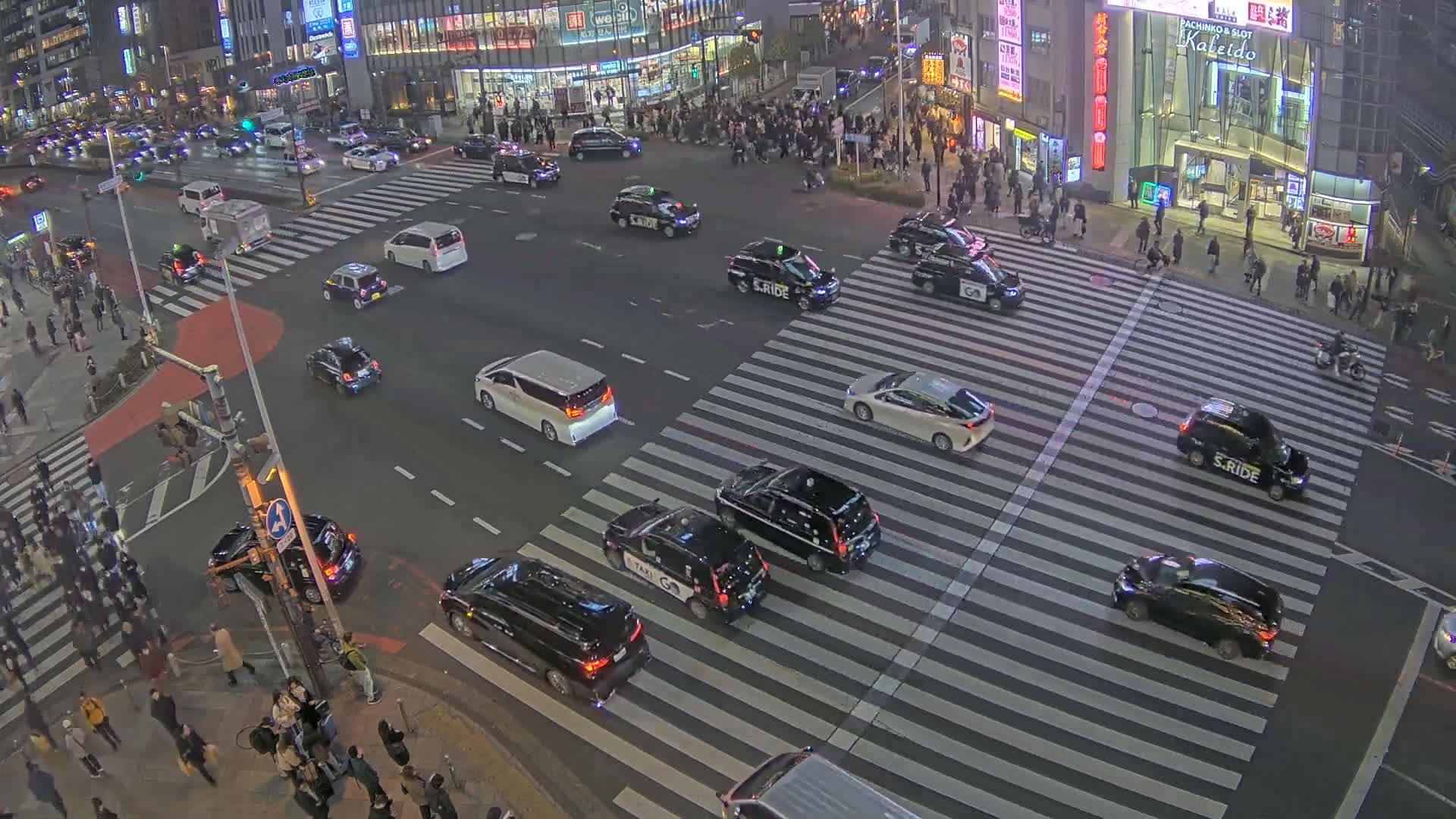 Tokyo, Shinjuku, Ome-kaido Avenue & Otakibashi-dori O Guard Intersection Scramble Crossing ( 東京 新宿青梅街道・小滝橋通り大ガード交差点スクランブル交差点) Live Cam  - Nishishinjuku, Shinjuku-ku, Tokyo, Kantō, Honshu, Japan