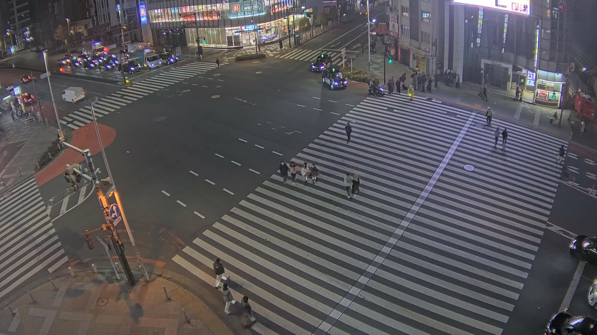 Tokyo, Shinjuku, Ome-kaido Avenue & Otakibashi-dori O Guard Intersection Scramble Crossing ( 東京 新宿青梅街道・小滝橋通り大ガード交差点スクランブル交差点) Live Cam  - Nishishinjuku, Shinjuku-ku, Tokyo, Kantō, Honshu, Japan