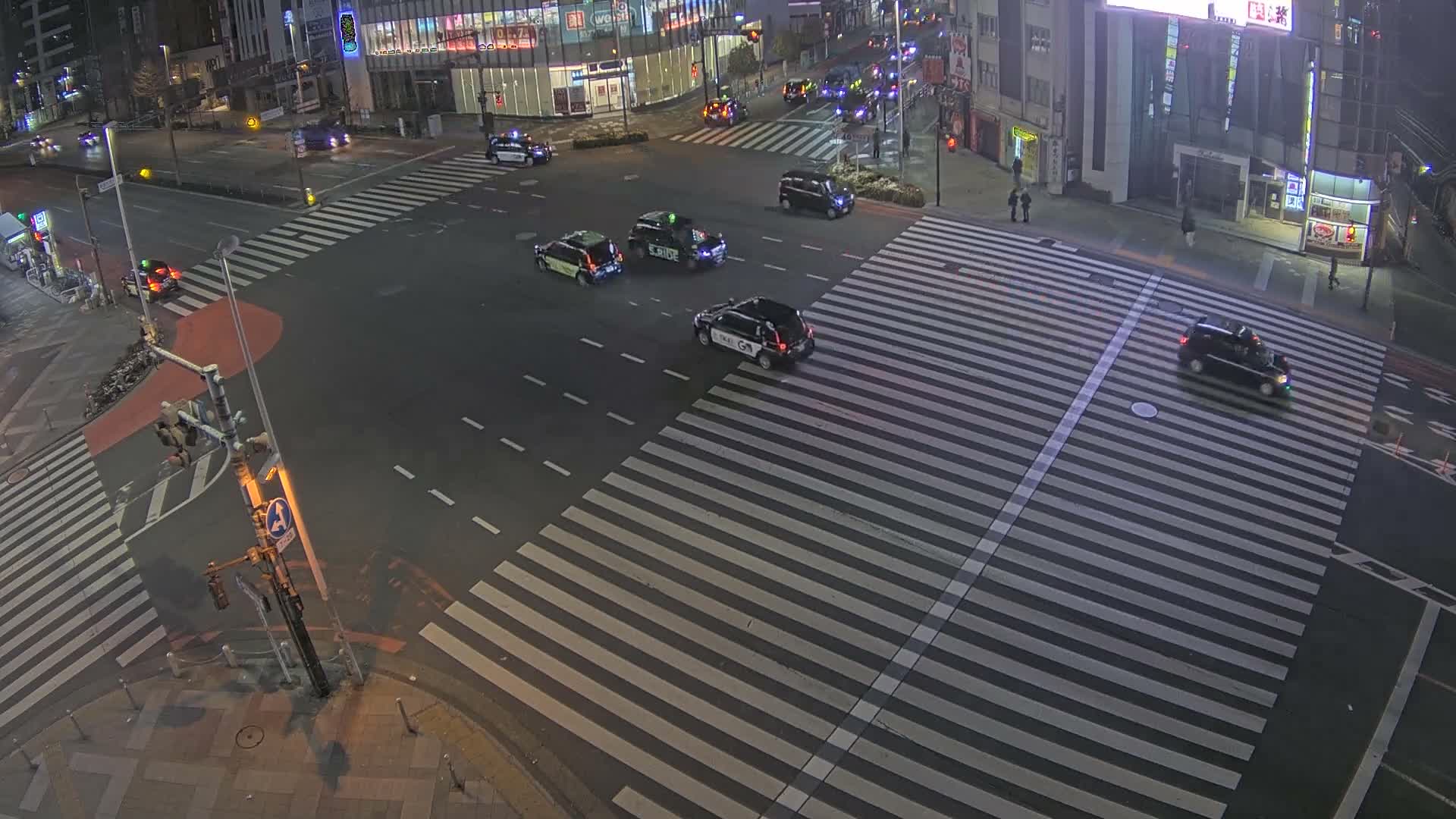 Tokyo, Shinjuku, Ome-kaido Avenue & Otakibashi-dori O Guard Intersection Scramble Crossing ( 東京 新宿青梅街道・小滝橋通り大ガード交差点スクランブル交差点) Live Cam  - Nishishinjuku, Shinjuku-ku, Tokyo, Kantō, Honshu, Japan