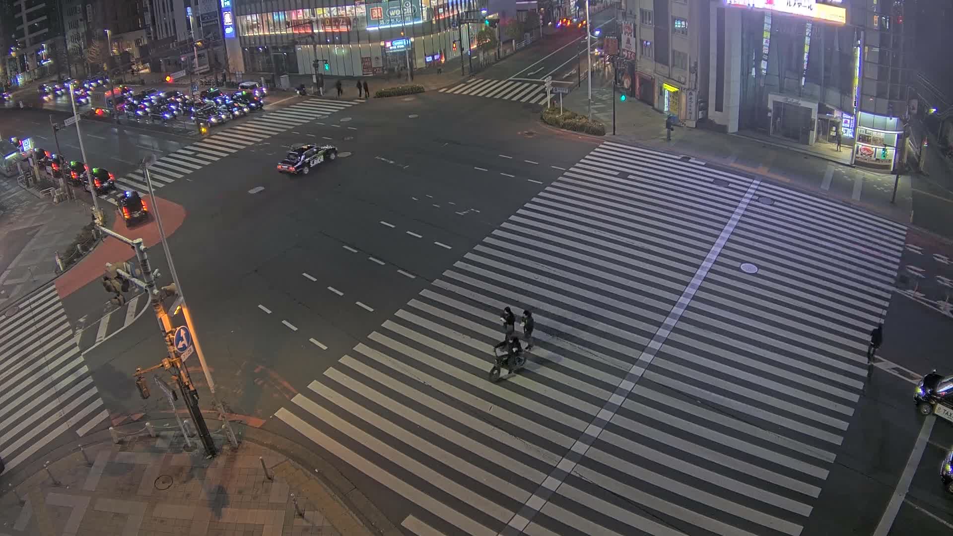 Tokyo, Shinjuku, Ome-kaido Avenue & Otakibashi-dori O Guard Intersection Scramble Crossing ( 東京 新宿青梅街道・小滝橋通り大ガード交差点スクランブル交差点) Live Cam  - Nishishinjuku, Shinjuku-ku, Tokyo, Kantō, Honshu, Japan