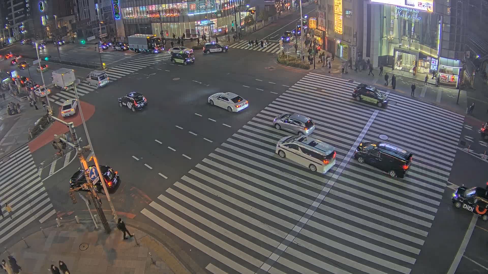 Tokyo, Shinjuku, Ome-kaido Avenue & Otakibashi-dori O Guard Intersection Scramble Crossing ( 東京 新宿青梅街道・小滝橋通り大ガード交差点スクランブル交差点) Live Cam  - Nishishinjuku, Shinjuku-ku, Tokyo, Kantō, Honshu, Japan