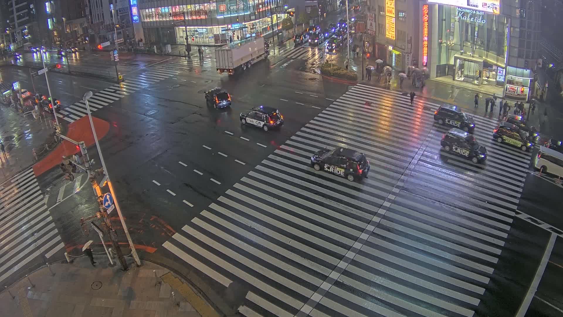 Tokyo, Shinjuku, Ome-kaido Avenue & Otakibashi-dori O Guard Intersection Scramble Crossing ( 東京 新宿青梅街道・小滝橋通り大ガード交差点スクランブル交差点) Live Cam  - Nishishinjuku, Shinjuku-ku, Tokyo, Kantō, Honshu, Japan