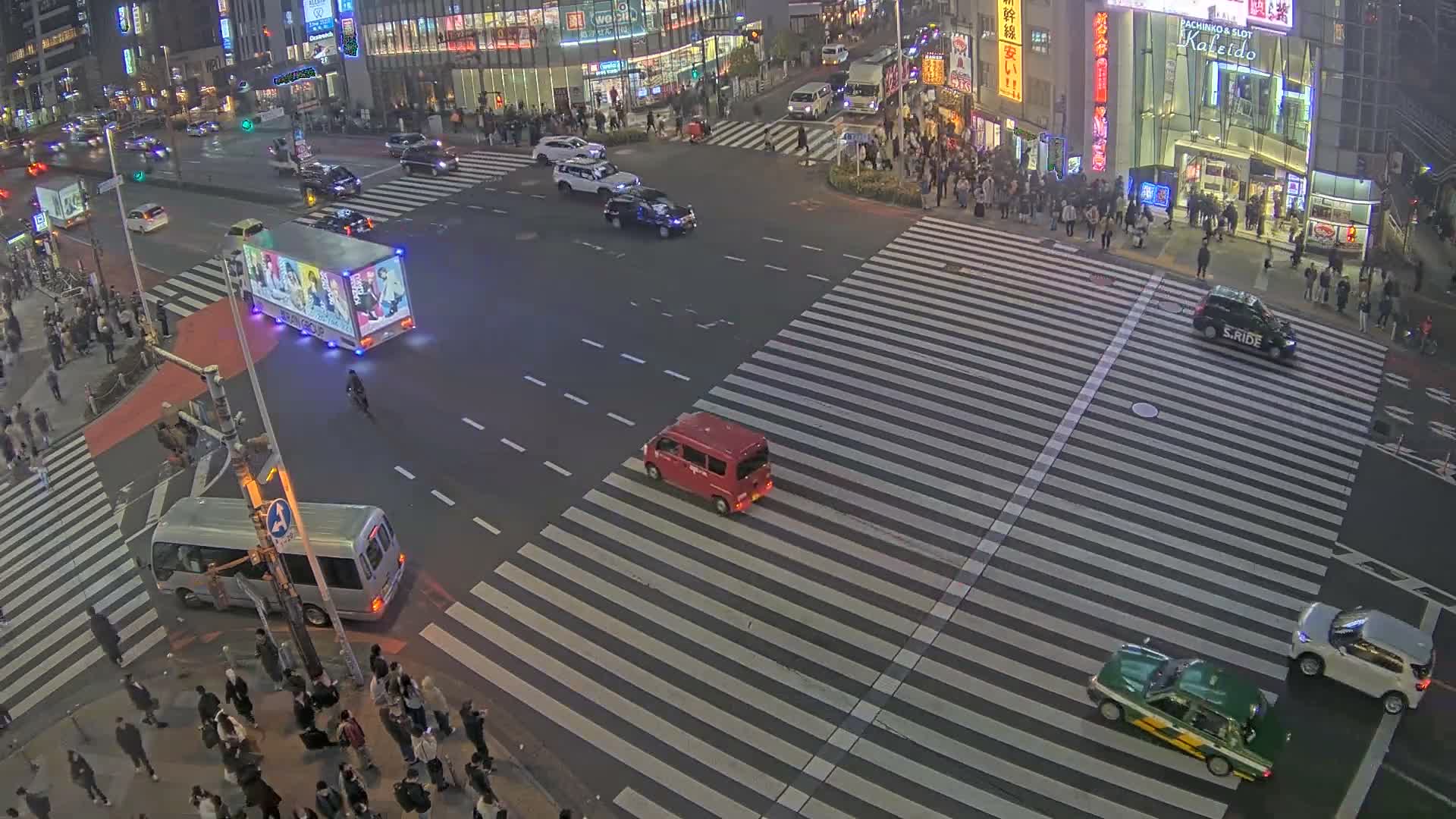 Tokyo, Shinjuku, Ome-kaido Avenue & Otakibashi-dori O Guard Intersection Scramble Crossing ( 東京 新宿青梅街道・小滝橋通り大ガード交差点スクランブル交差点) Live Cam  - Nishishinjuku, Shinjuku-ku, Tokyo, Kantō, Honshu, Japan