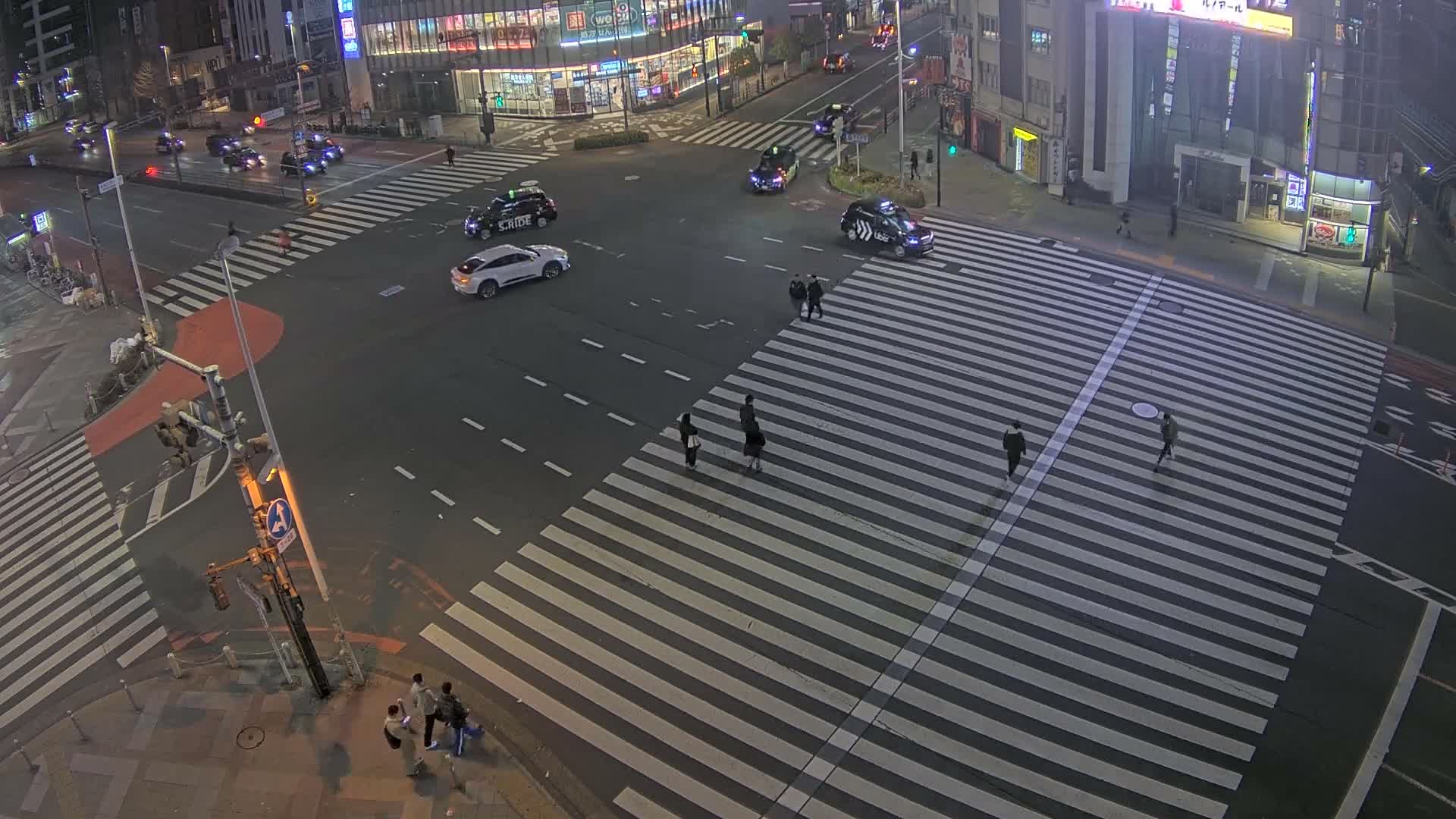 Tokyo, Shinjuku, Ome-kaido Avenue & Otakibashi-dori O Guard Intersection Scramble Crossing ( 東京 新宿青梅街道・小滝橋通り大ガード交差点スクランブル交差点) Live Cam  - Nishishinjuku, Shinjuku-ku, Tokyo, Kantō, Honshu, Japan