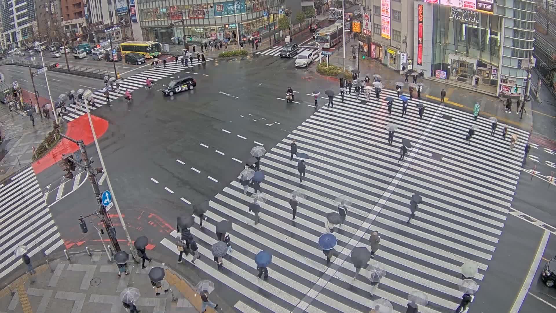 Tokyo, Shinjuku, Ome-kaido Avenue & Otakibashi-dori O Guard Intersection Scramble Crossing ( 東京 新宿青梅街道・小滝橋通り大ガード交差点スクランブル交差点) Live Cam  - Nishishinjuku, Shinjuku-ku, Tokyo, Kantō, Honshu, Japan