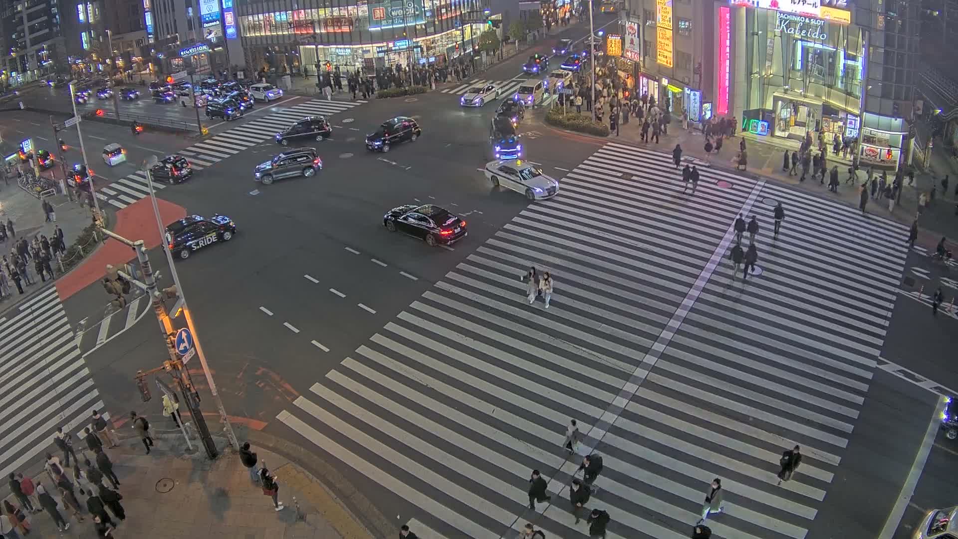 Tokyo, Shinjuku, Ome-kaido Avenue & Otakibashi-dori O Guard Intersection Scramble Crossing ( 東京 新宿青梅街道・小滝橋通り大ガード交差点スクランブル交差点) Live Cam  - Nishishinjuku, Shinjuku-ku, Tokyo, Kantō, Honshu, Japan
