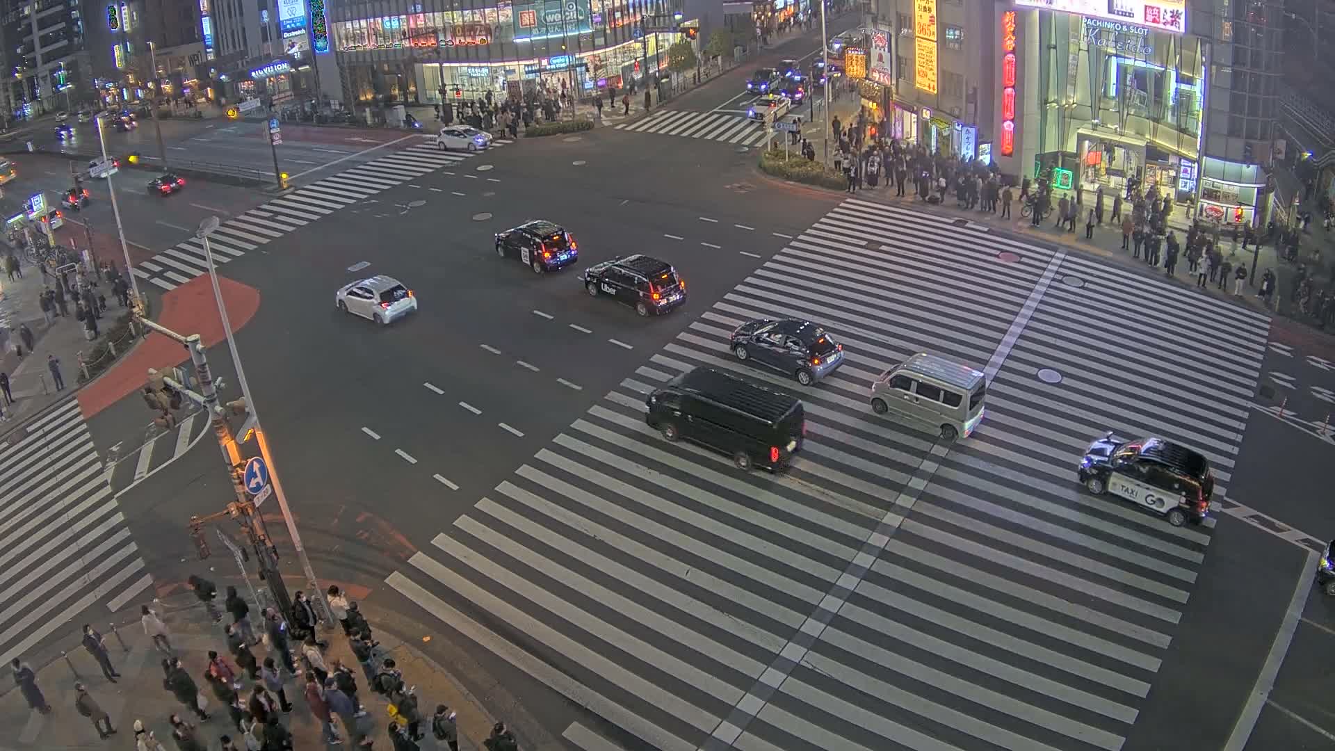 Tokyo, Shinjuku, Ome-kaido Avenue & Otakibashi-dori O Guard Intersection Scramble Crossing ( 東京 新宿青梅街道・小滝橋通り大ガード交差点スクランブル交差点) Live Cam  - Nishishinjuku, Shinjuku-ku, Tokyo, Kantō, Honshu, Japan