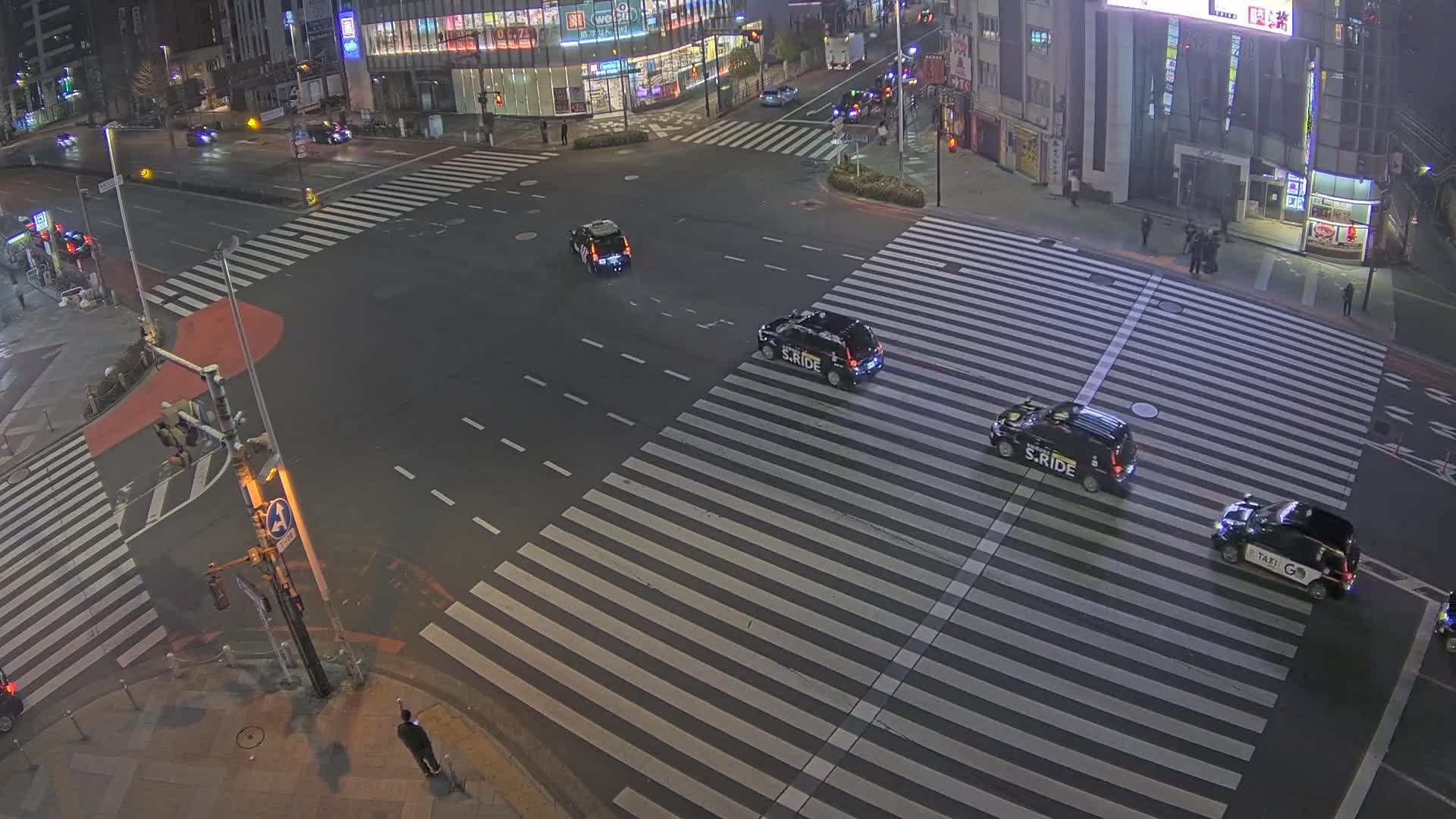 Tokyo, Shinjuku, Ome-kaido Avenue & Otakibashi-dori O Guard Intersection Scramble Crossing ( 東京 新宿青梅街道・小滝橋通り大ガード交差点スクランブル交差点) Live Cam  - Nishishinjuku, Shinjuku-ku, Tokyo, Kantō, Honshu, Japan