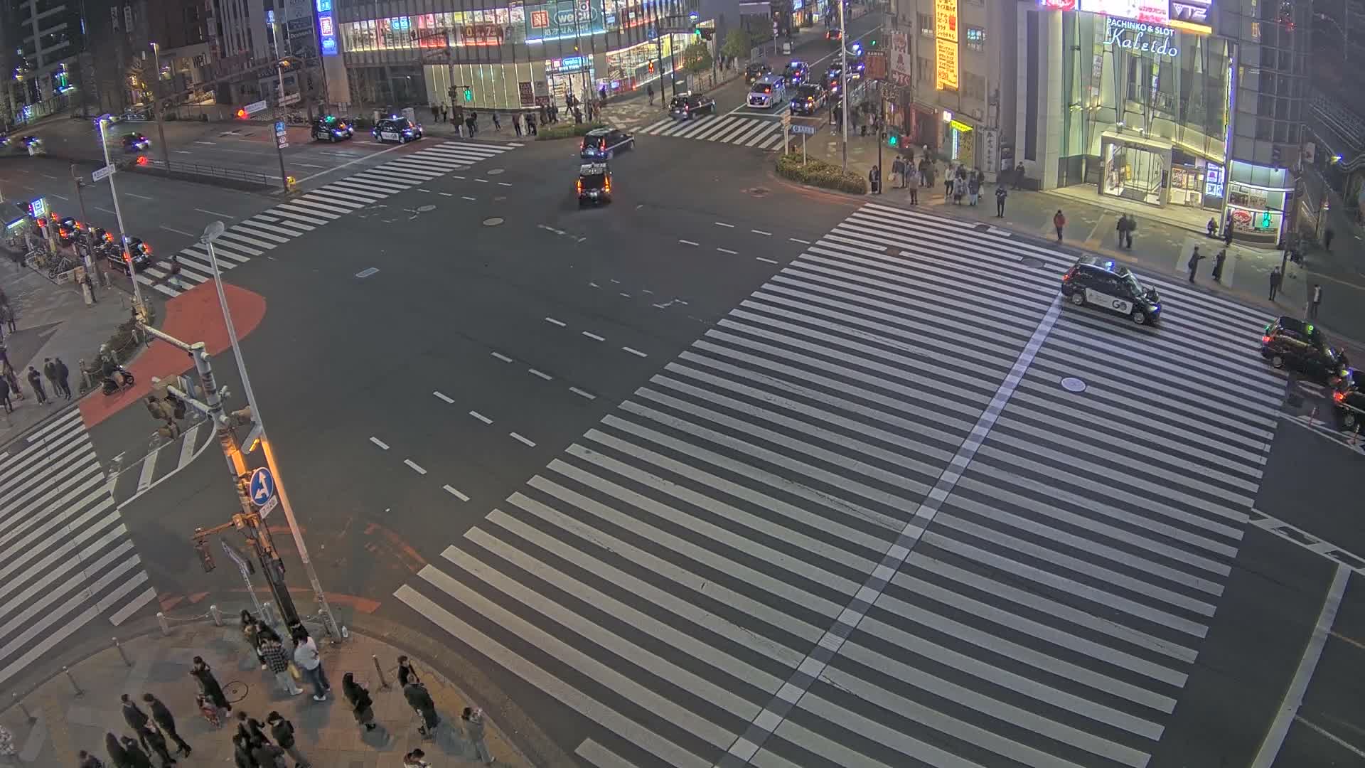 Tokyo, Shinjuku, Ome-kaido Avenue & Otakibashi-dori O Guard Intersection Scramble Crossing ( 東京 新宿青梅街道・小滝橋通り大ガード交差点スクランブル交差点) Live Cam  - Nishishinjuku, Shinjuku-ku, Tokyo, Kantō, Honshu, Japan