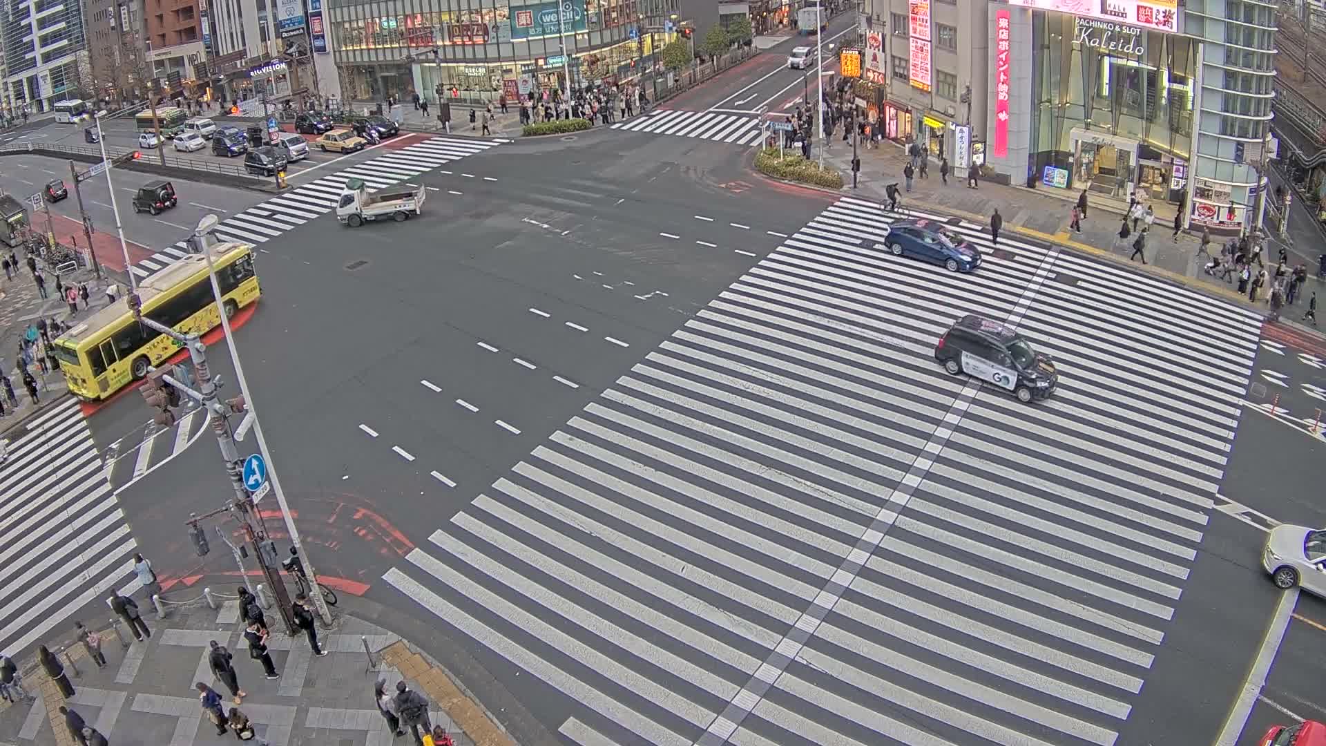 Tokyo, Shinjuku, Ome-kaido Avenue & Otakibashi-dori O Guard Intersection Scramble Crossing ( 東京 新宿青梅街道・小滝橋通り大ガード交差点スクランブル交差点) Live Cam  - Nishishinjuku, Shinjuku-ku, Tokyo, Kantō, Honshu, Japan