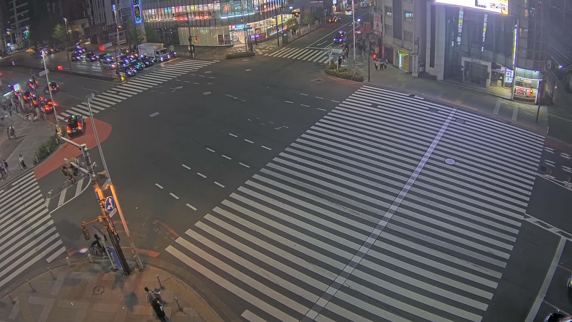 Tokyo, Shinjuku, Ome-kaido Avenue & Otakibashi-dori O Guard Intersection Scramble Crossing ( 東京 新宿青梅街道・小滝橋通り大ガード交差点スクランブル交差点) Live Cam  - Nishishinjuku, Shinjuku-ku, Tokyo, Kantō, Honshu, Japan
