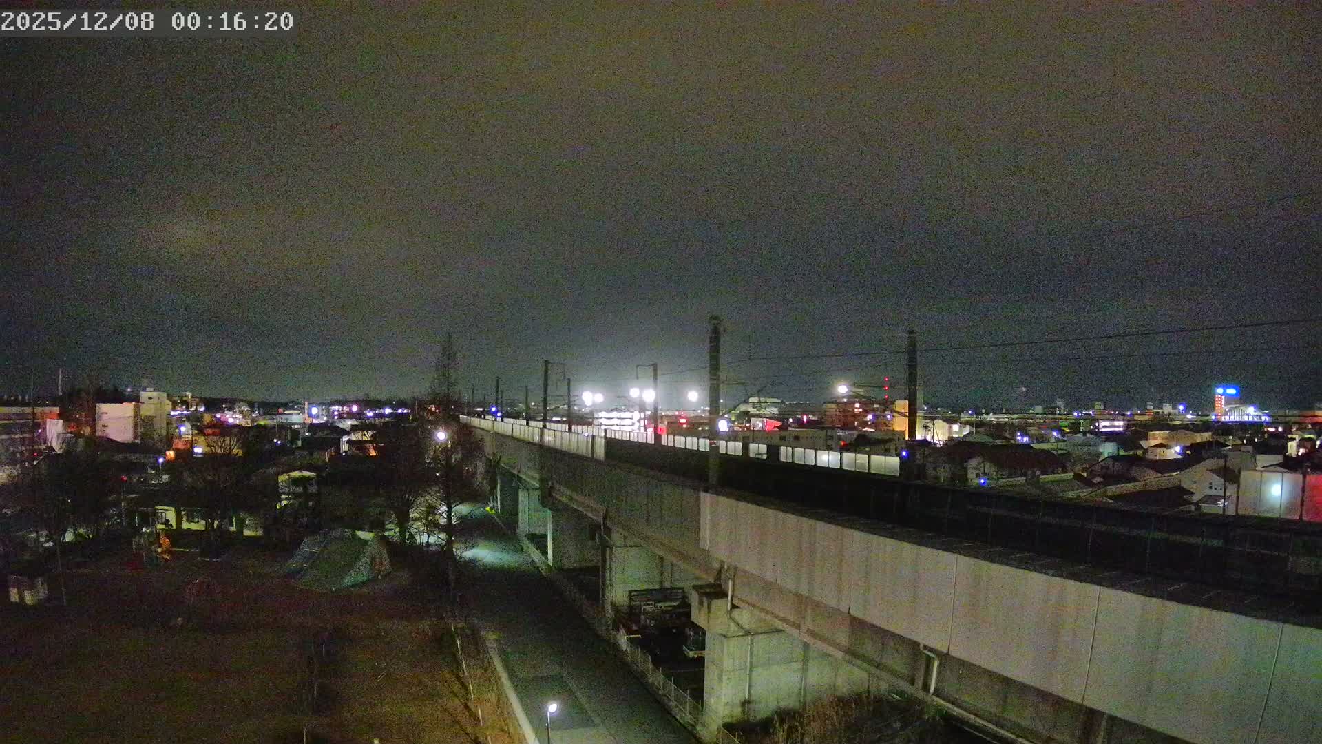 Koriyama City Skyline & Tonoku / Akita Shinkansen ( Bullet Train ) Viaduct ( 郡山市街のスカイラインと東濃・秋田新幹線高架橋 ) Live Cam - 2 Chome, Asakamachi Hidenoyama, Koriyama, Fukuşima, Tōhoku, Honshu, Japan