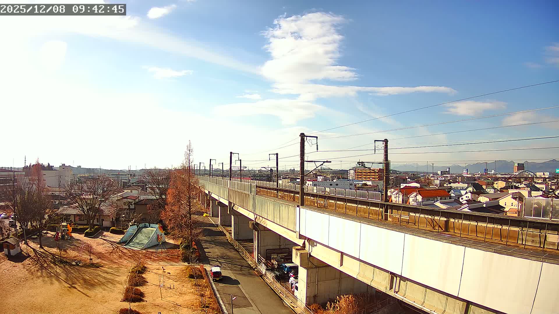 Koriyama City Skyline & Tonoku / Akita Shinkansen ( Bullet Train ) Viaduct ( 郡山市街のスカイラインと東濃・秋田新幹線高架橋 ) Live Cam - 2 Chome, Asakamachi Hidenoyama, Koriyama, Fukuşima, Tōhoku, Honshu, Japan