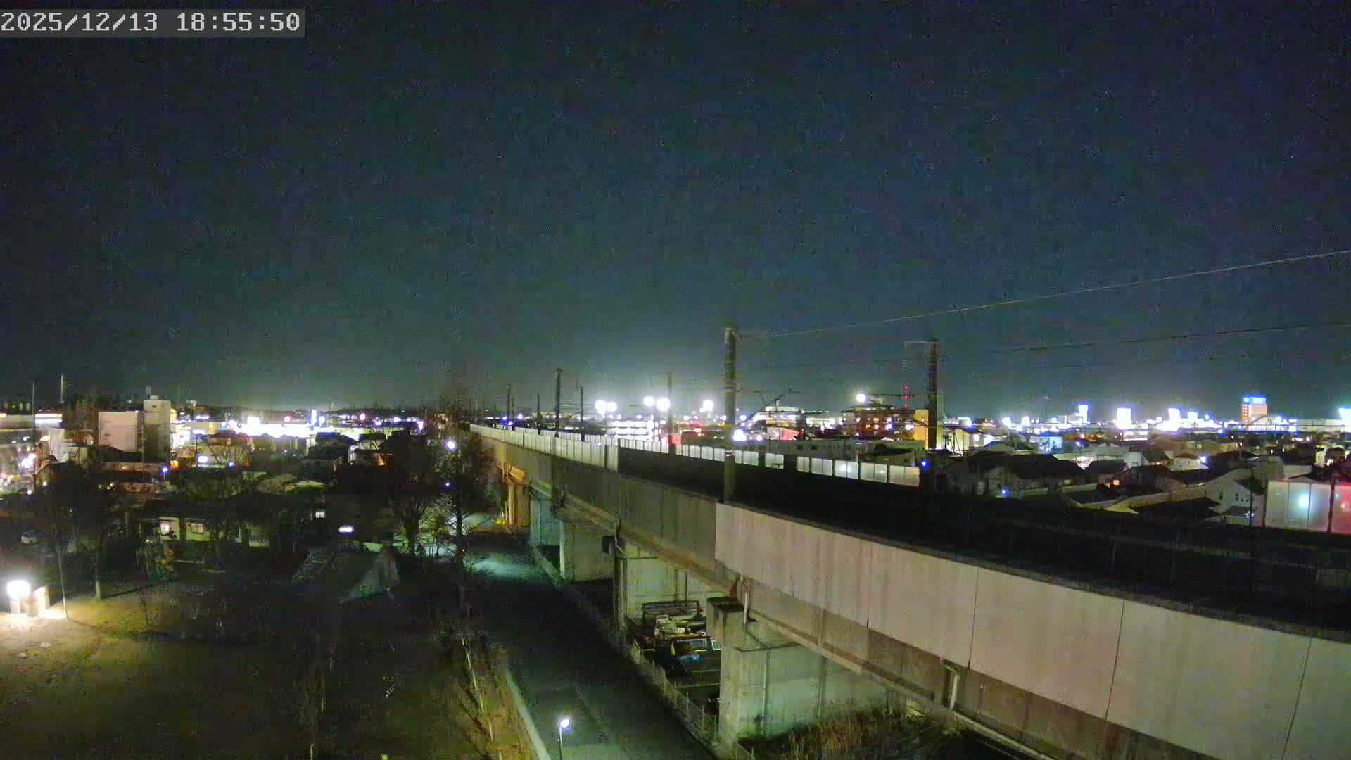 Koriyama City Skyline & Tonoku / Akita Shinkansen ( Bullet Train ) Viaduct ( 郡山市街のスカイラインと東濃・秋田新幹線高架橋 ) Live Cam - 2 Chome, Asakamachi Hidenoyama, Koriyama, Fukuşima, Tōhoku, Honshu, Japan