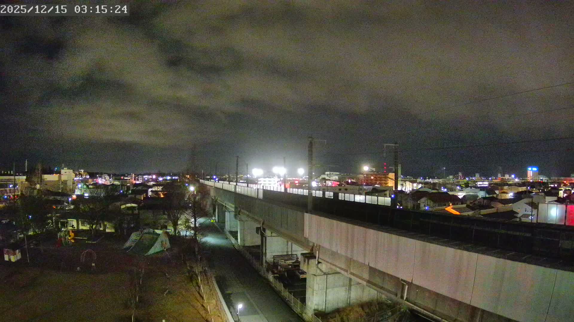 Koriyama City Skyline & Tonoku / Akita Shinkansen ( Bullet Train ) Viaduct ( 郡山市街のスカイラインと東濃・秋田新幹線高架橋 ) Live Cam - 2 Chome, Asakamachi Hidenoyama, Koriyama, Fukuşima, Tōhoku, Honshu, Japan