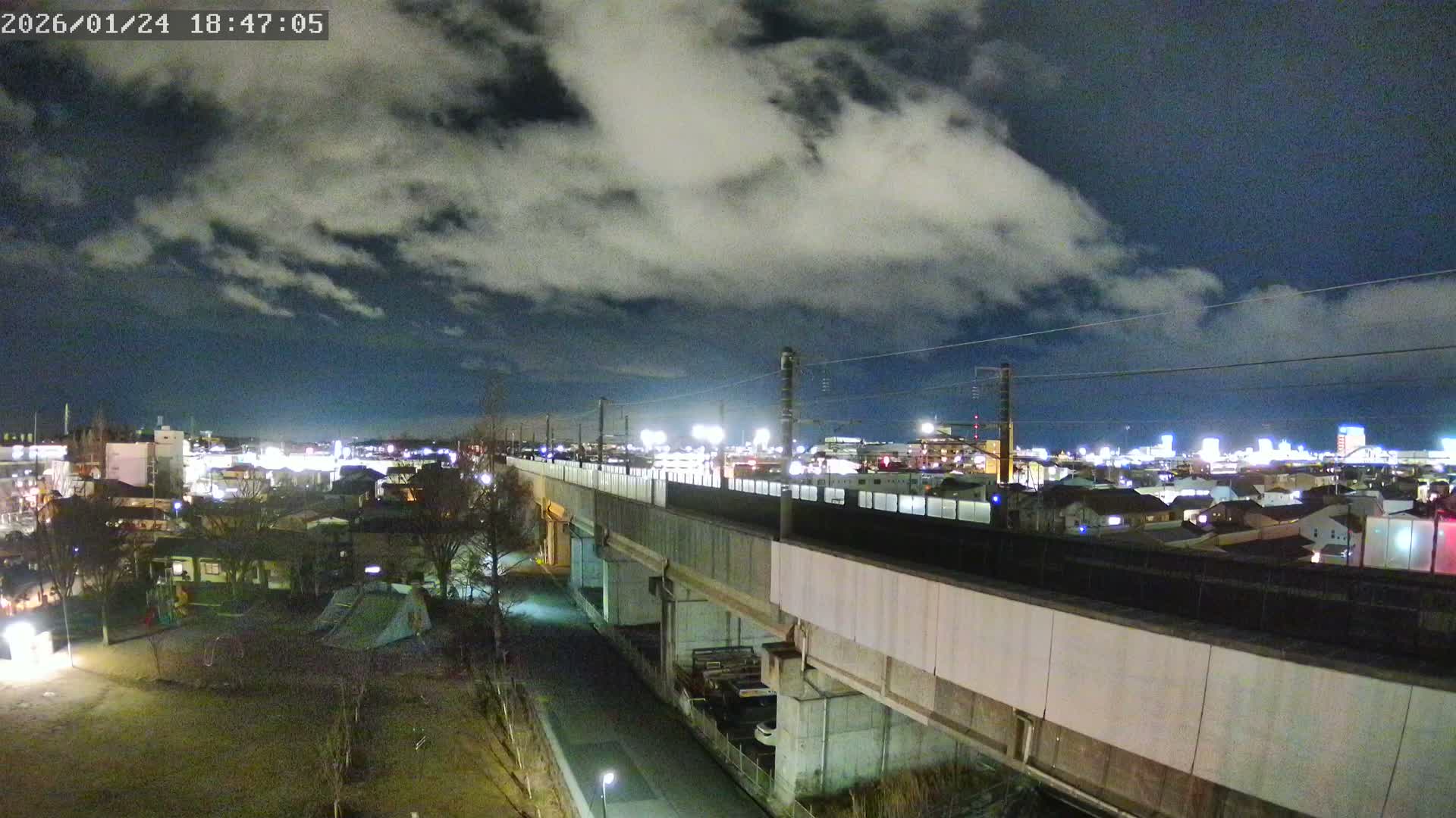 Koriyama City Skyline & Tonoku / Akita Shinkansen ( Bullet Train ) Viaduct ( 郡山市街のスカイラインと東濃・秋田新幹線高架橋 ) Live Cam - 2 Chome, Asakamachi Hidenoyama, Koriyama, Fukuşima, Tōhoku, Honshu, Japan