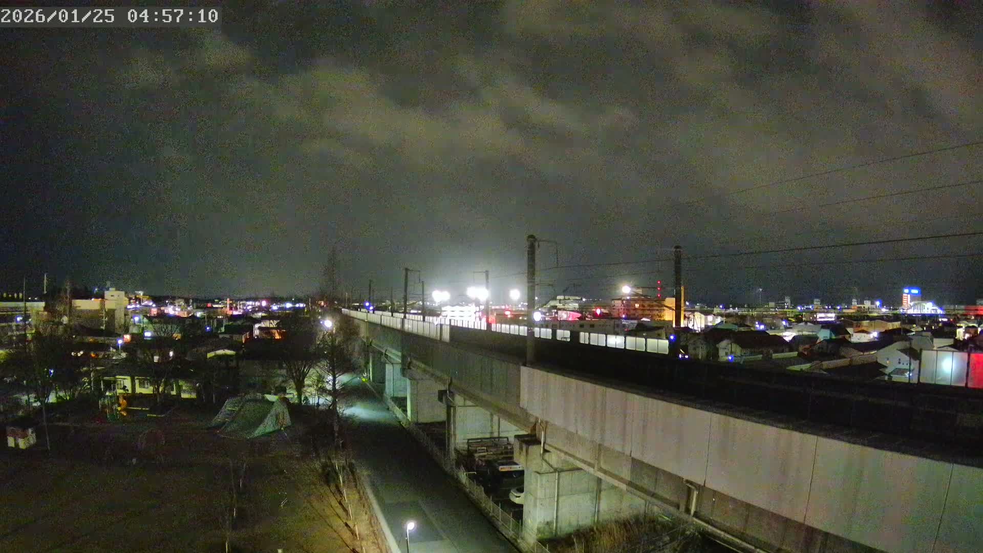 Koriyama City Skyline & Tonoku / Akita Shinkansen ( Bullet Train ) Viaduct ( 郡山市街のスカイラインと東濃・秋田新幹線高架橋 ) Live Cam - 2 Chome, Asakamachi Hidenoyama, Koriyama, Fukuşima, Tōhoku, Honshu, Japan