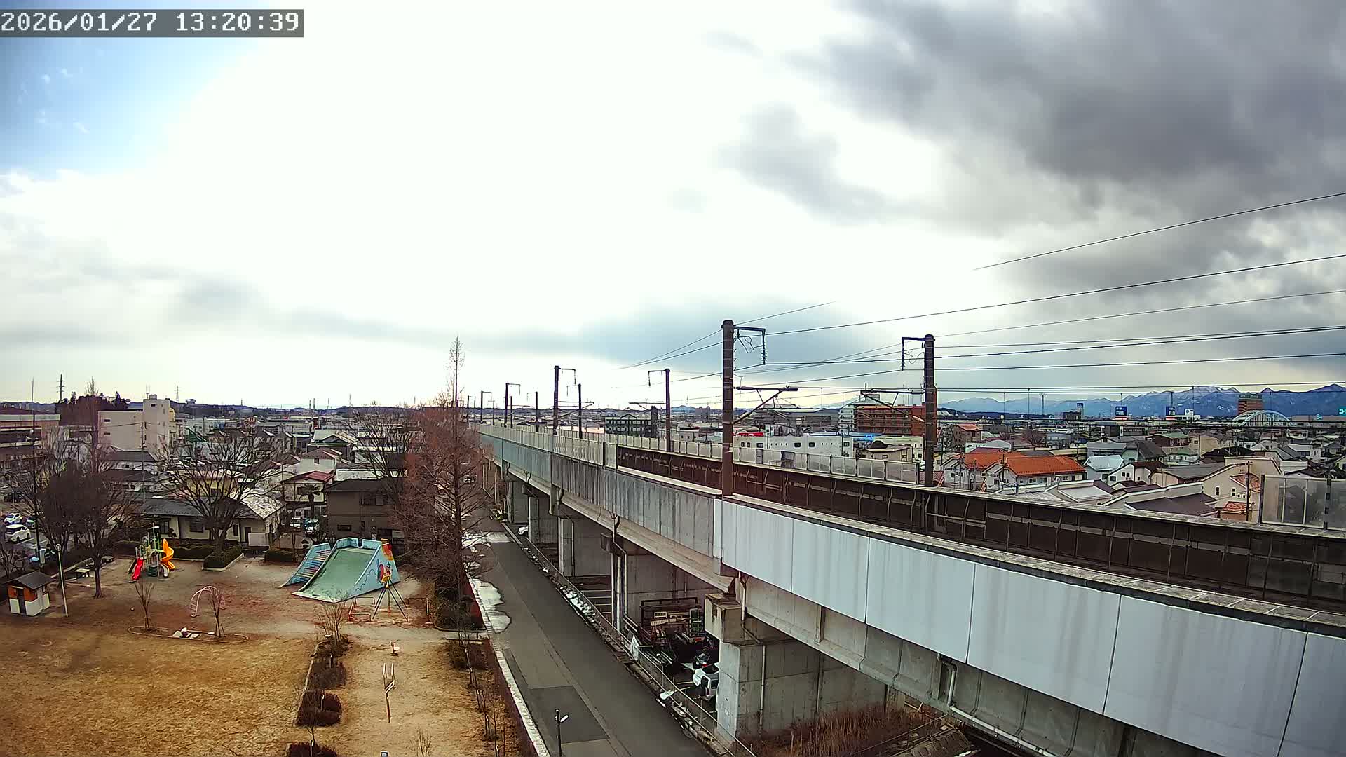 Koriyama City Skyline & Tonoku / Akita Shinkansen ( Bullet Train ) Viaduct ( 郡山市街のスカイラインと東濃・秋田新幹線高架橋 ) Live Cam - 2 Chome, Asakamachi Hidenoyama, Koriyama, Fukuşima, Tōhoku, Honshu, Japan