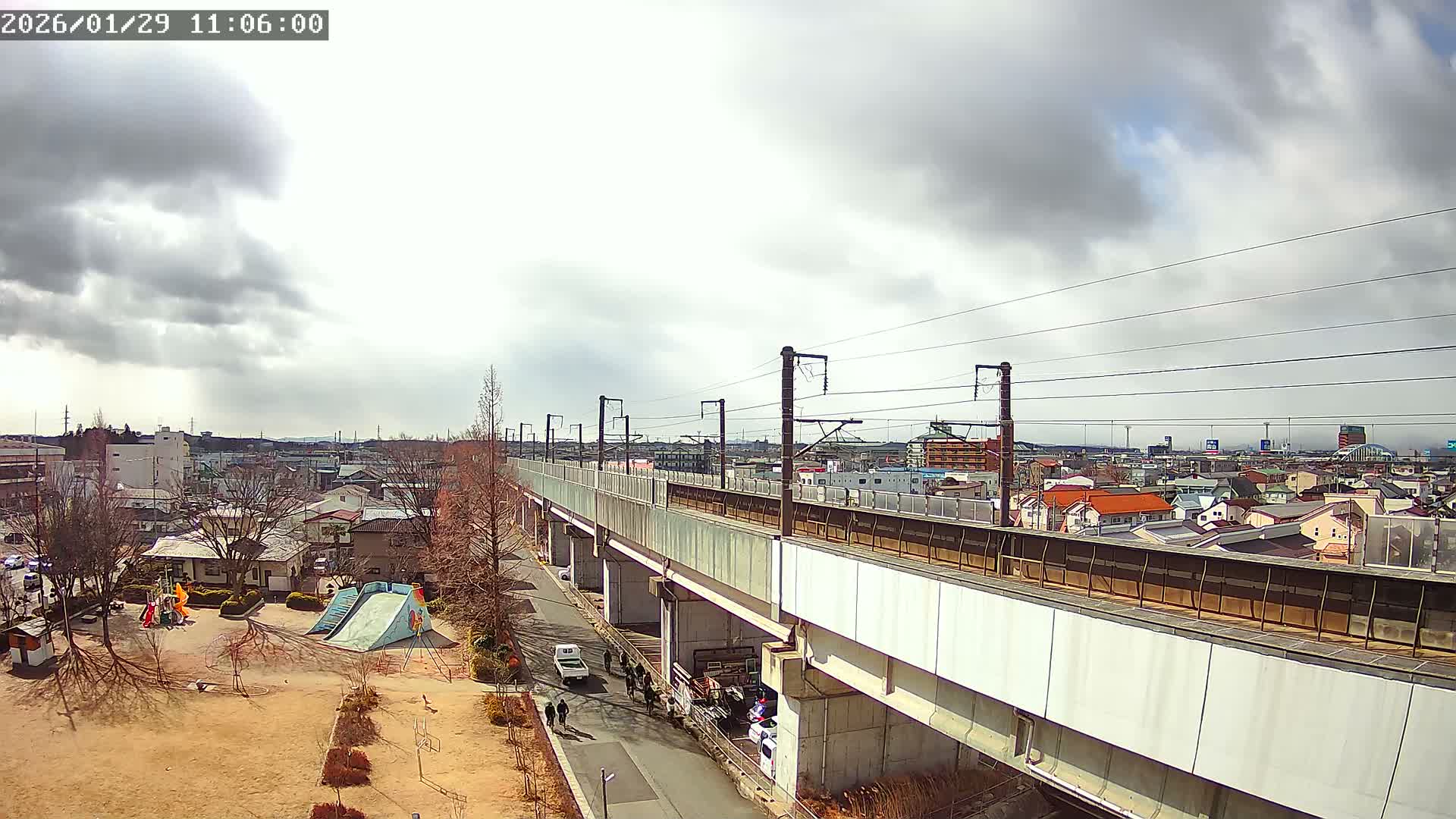 Koriyama City Skyline & Tonoku / Akita Shinkansen ( Bullet Train ) Viaduct ( 郡山市街のスカイラインと東濃・秋田新幹線高架橋 ) Live Cam - 2 Chome, Asakamachi Hidenoyama, Koriyama, Fukuşima, Tōhoku, Honshu, Japan