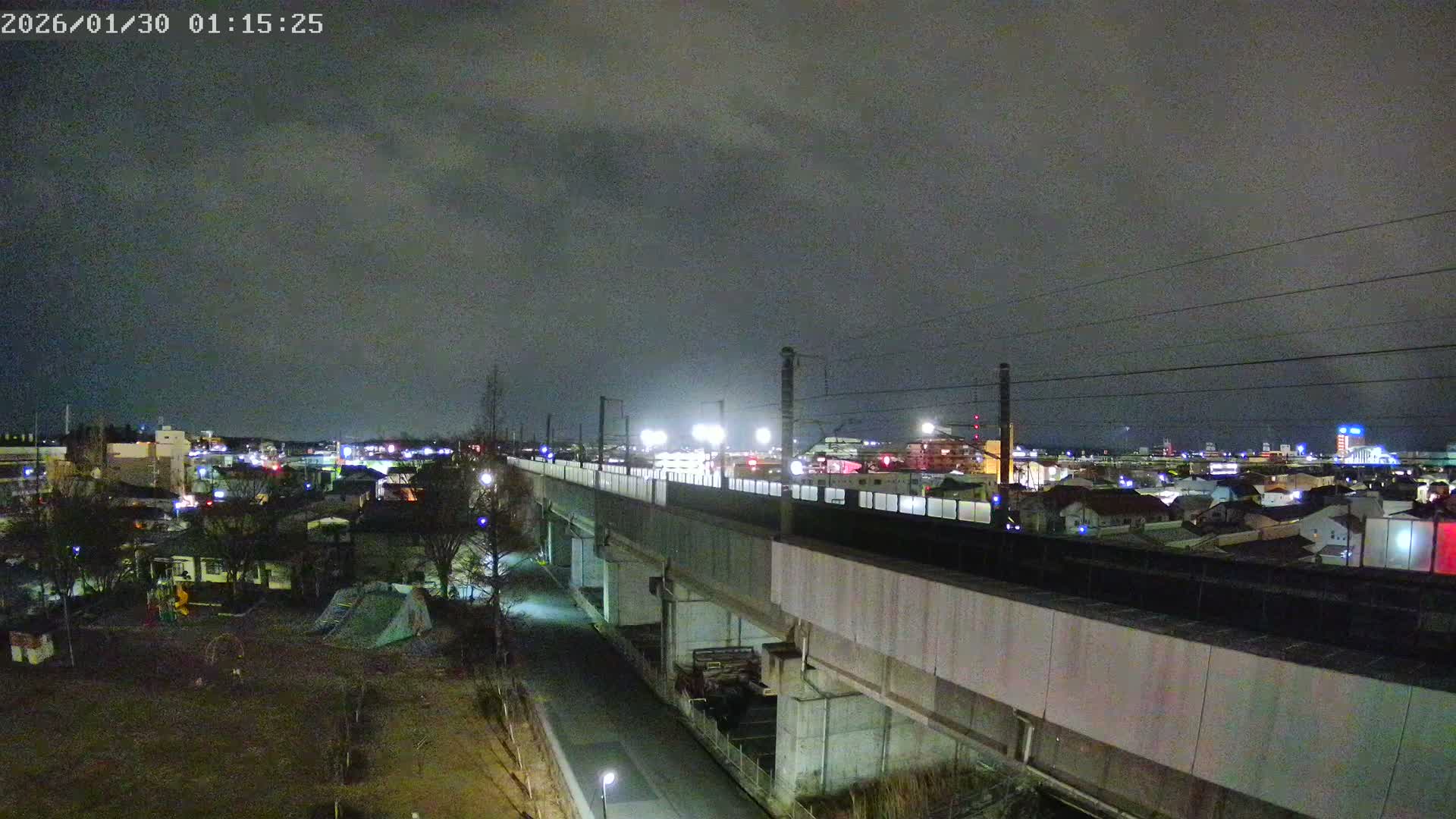 Koriyama City Skyline & Tonoku / Akita Shinkansen ( Bullet Train ) Viaduct ( 郡山市街のスカイラインと東濃・秋田新幹線高架橋 ) Live Cam - 2 Chome, Asakamachi Hidenoyama, Koriyama, Fukuşima, Tōhoku, Honshu, Japan