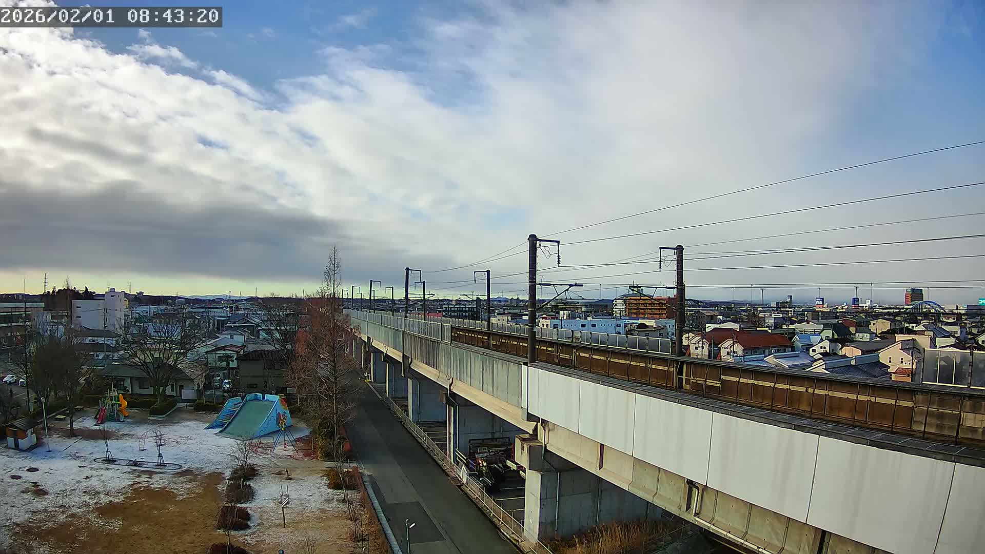 Koriyama City Skyline & Tonoku / Akita Shinkansen ( Bullet Train ) Viaduct ( 郡山市街のスカイラインと東濃・秋田新幹線高架橋 ) Live Cam - 2 Chome, Asakamachi Hidenoyama, Koriyama, Fukuşima, Tōhoku, Honshu, Japan