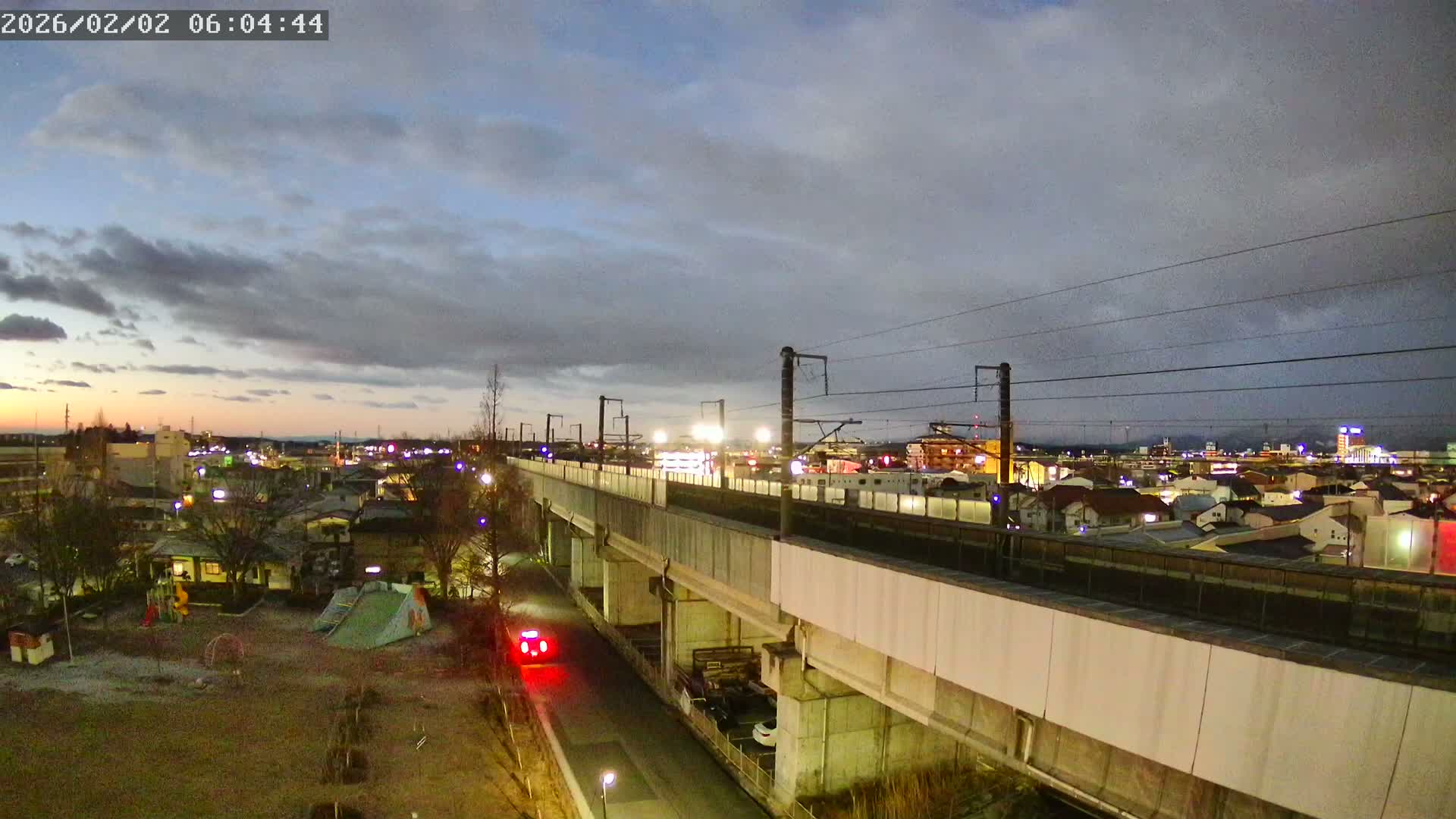Koriyama City Skyline & Tonoku / Akita Shinkansen ( Bullet Train ) Viaduct ( 郡山市街のスカイラインと東濃・秋田新幹線高架橋 ) Live Cam - 2 Chome, Asakamachi Hidenoyama, Koriyama, Fukuşima, Tōhoku, Honshu, Japan
