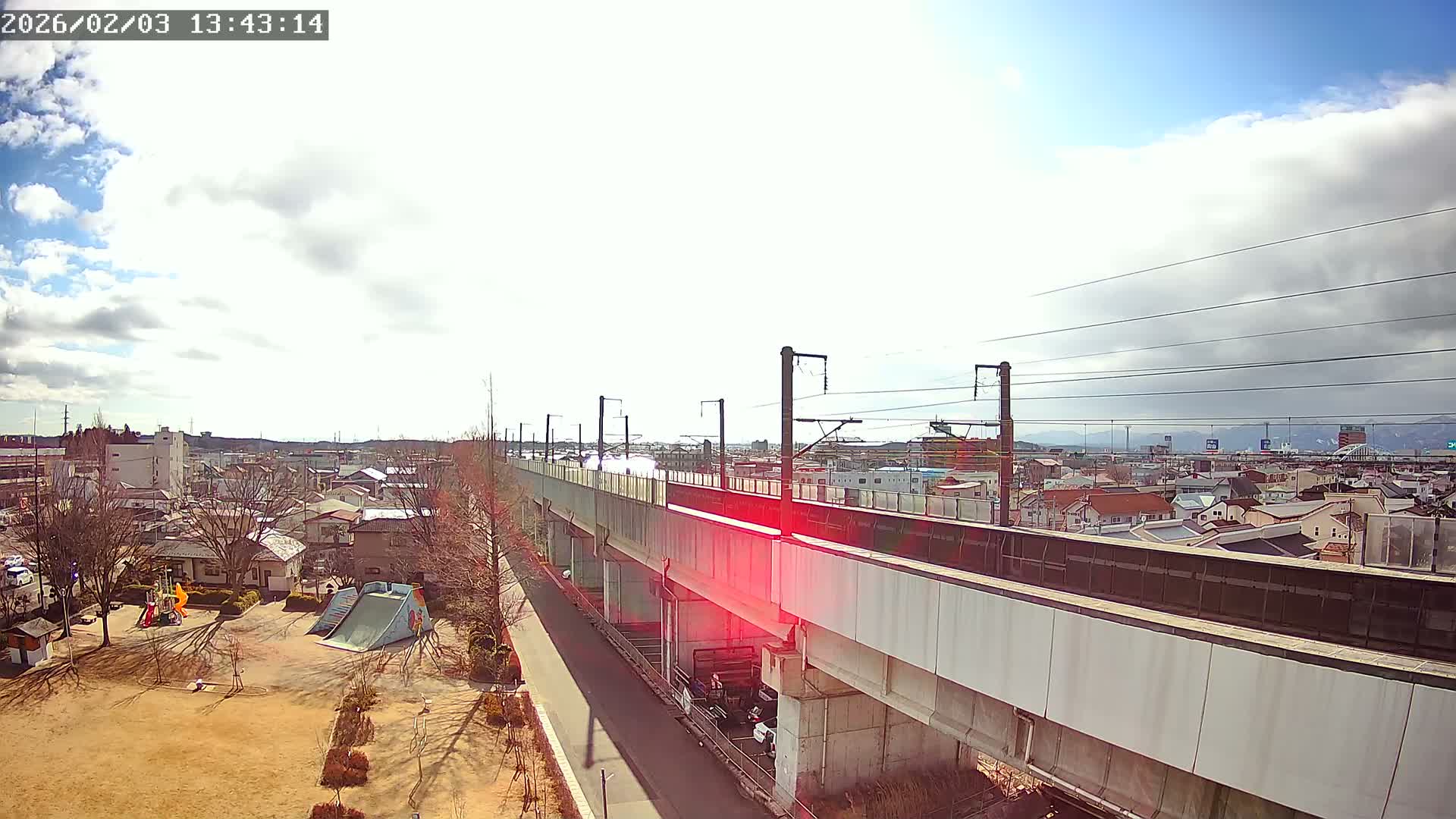 Koriyama City Skyline & Tonoku / Akita Shinkansen ( Bullet Train ) Viaduct ( 郡山市街のスカイラインと東濃・秋田新幹線高架橋 ) Live Cam - 2 Chome, Asakamachi Hidenoyama, Koriyama, Fukuşima, Tōhoku, Honshu, Japan
